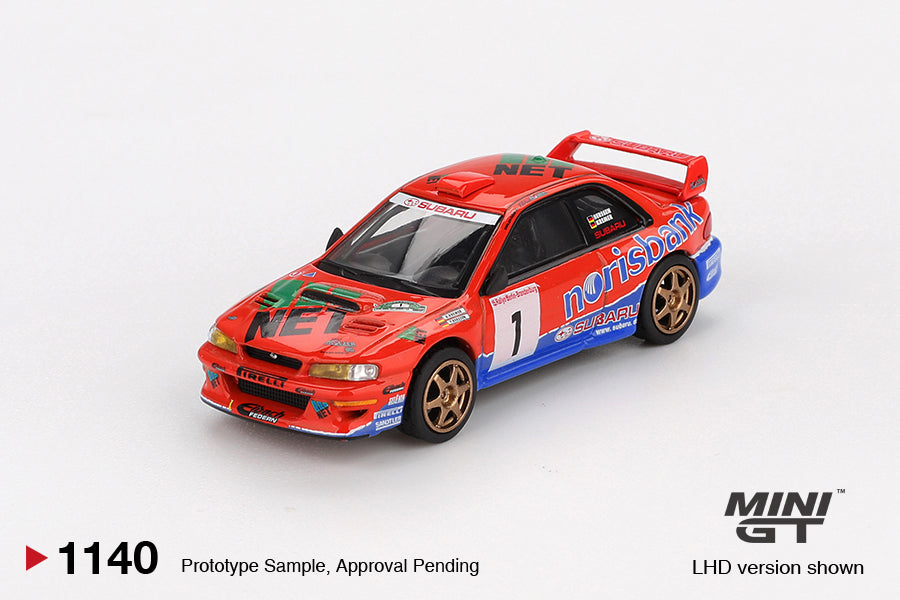 Mini GT 1:64 Subaru Impreza WRC97 #1 DRM Champion 1999 diecast model car in blue and gold livery. Front