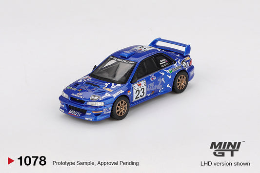 Mini GT Subaru Impreza WRC99 #23 from Acropolis Rally 2000 in blue rally livery with white graphics. Front