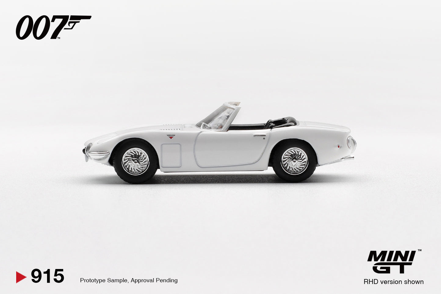 Mini GT 1:64 Toyota 2000GT Roadster You Only Live Twice 1967 white diecast model. Side