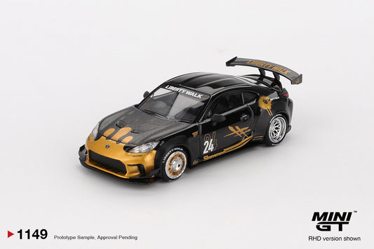 1:64 Mini GT Toyota GR Supra LB-Nation Black & Gold 2025 – widebody JDM die-cast model. Front