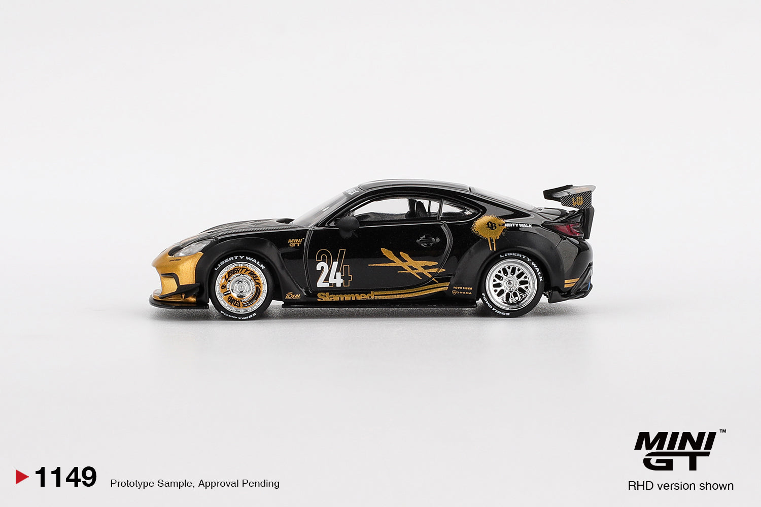 1:64 Mini GT Toyota GR Supra LB-Nation Black & Gold 2025 – widebody JDM die-cast model. Side
