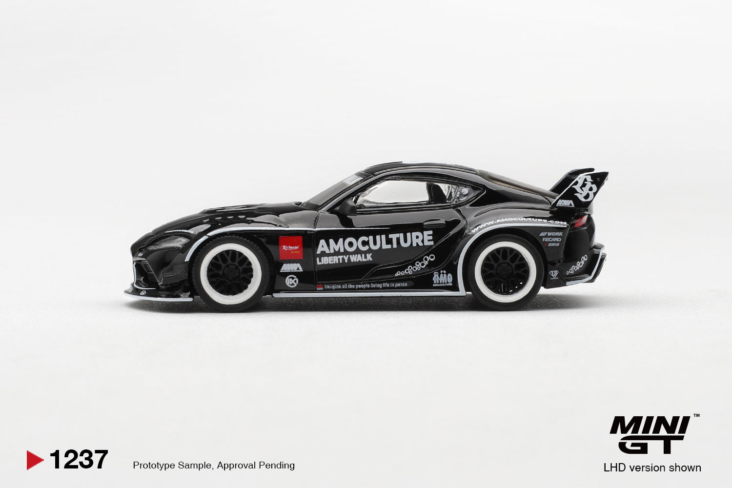 Mini GT Toyota GR Supra LB Works Amoculture 2026 1:64 diecast model. Side