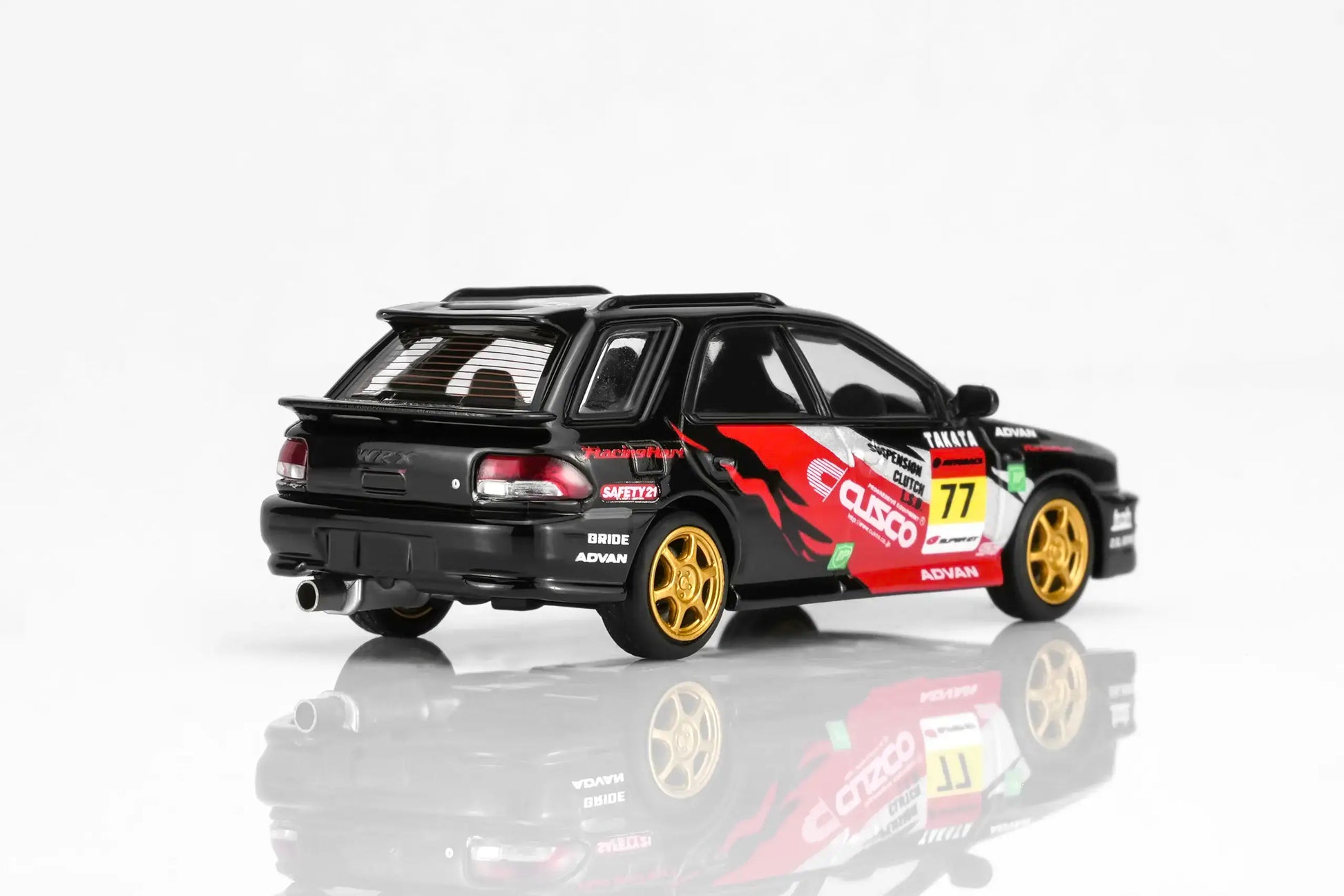 MotorHelix Subaru Impreza WRX STi Ver VI Wagon in CUSCO black livery with opening hood.