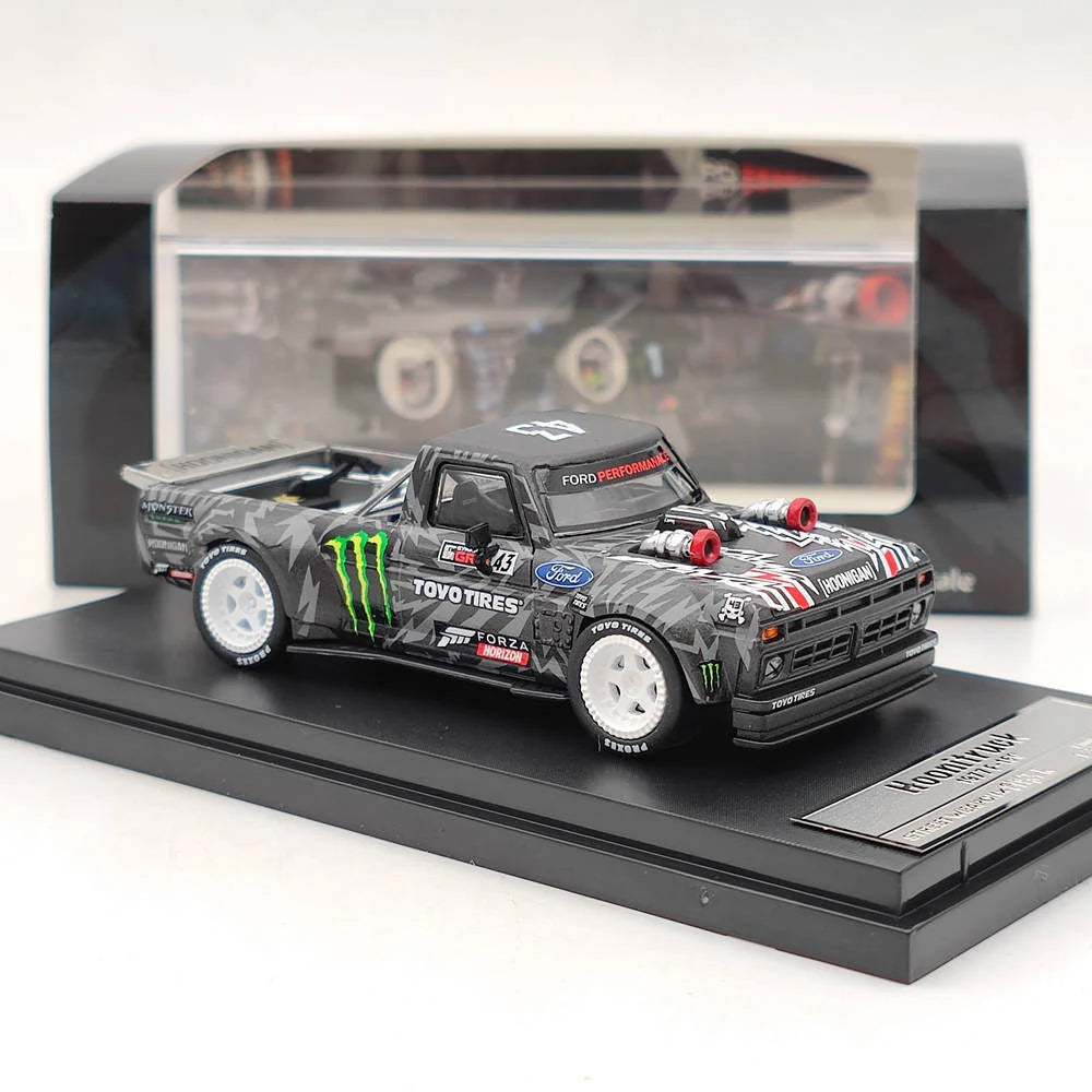 Sparky 1:64 Ken Block Ford F-150 Hoonitruck Street Weapon with display base and acrylic case.