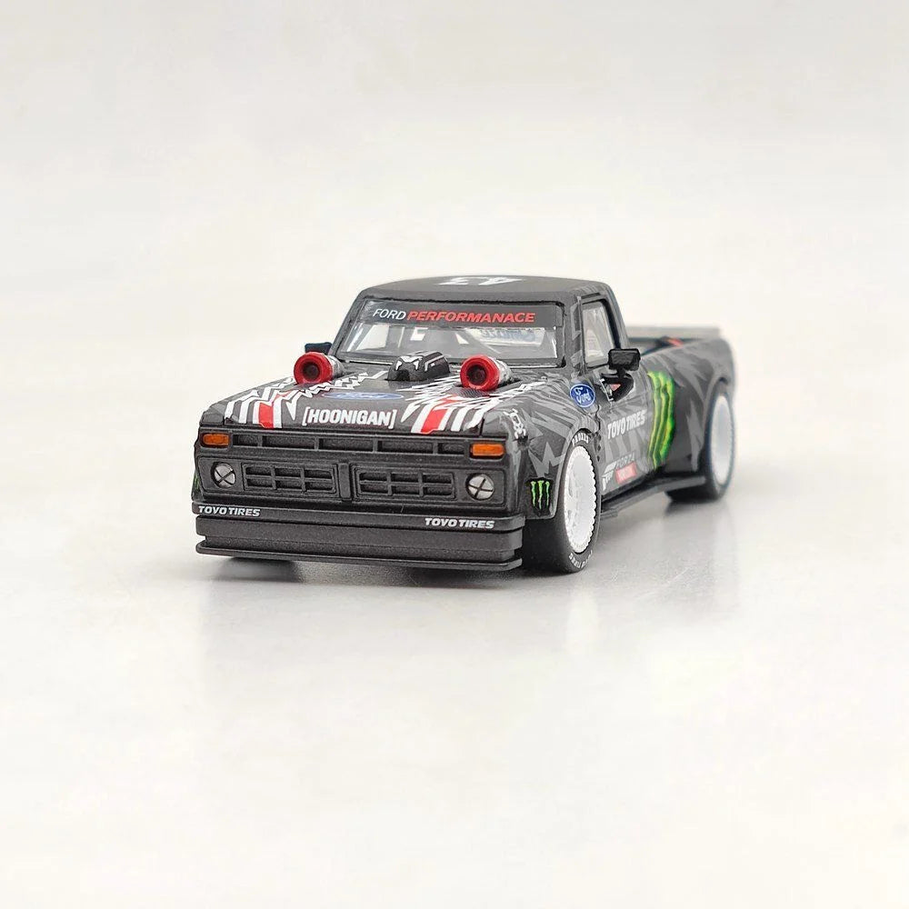 Sparky 1:64 Ken Block Ford F-150 Hoonitruck Street Weapon with display base and acrylic case.