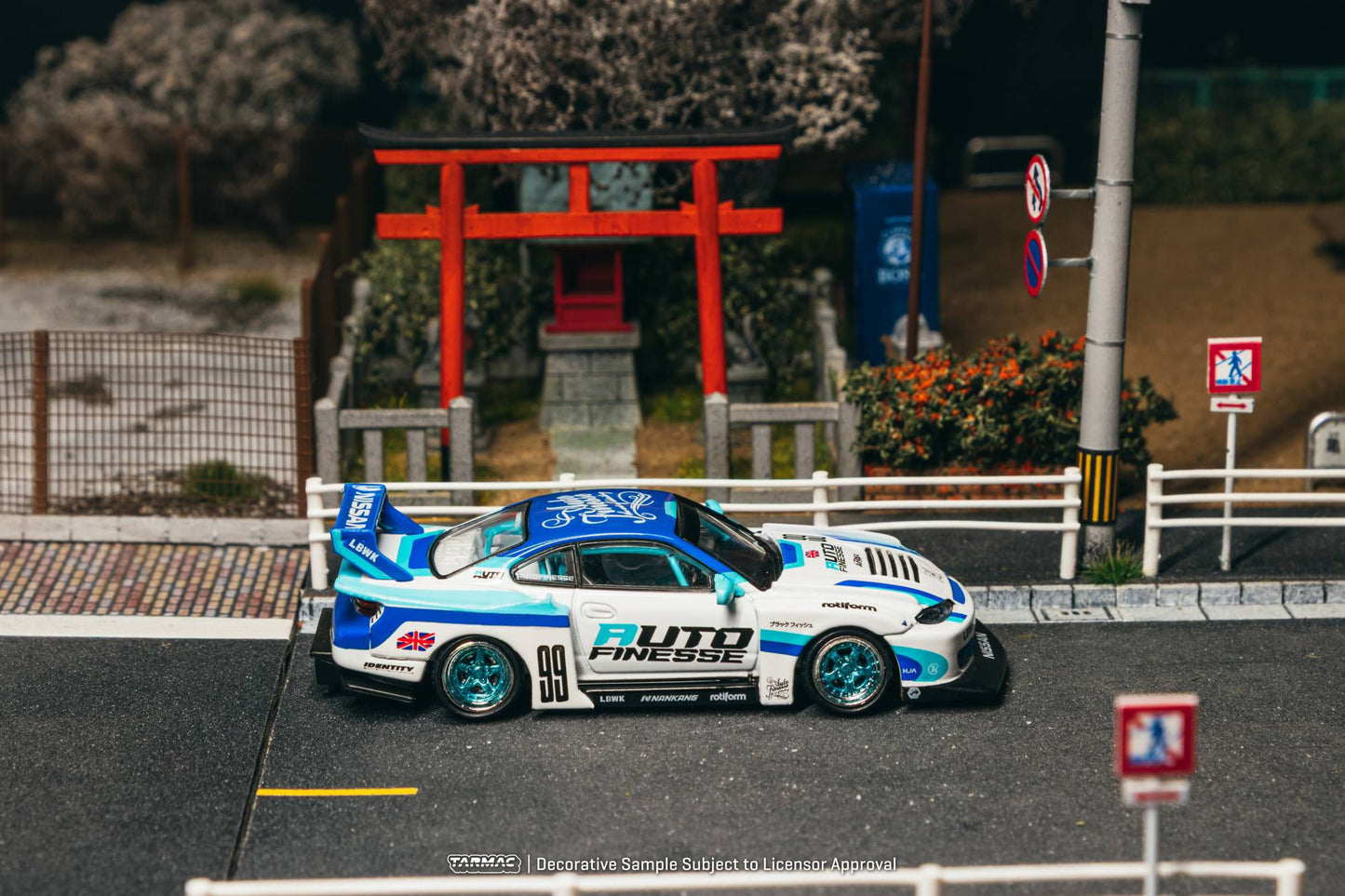 Tarmac Works Nissan Silvia S15 LB Super Silhouette Auto Finesse from the Hobby64 collection. Side