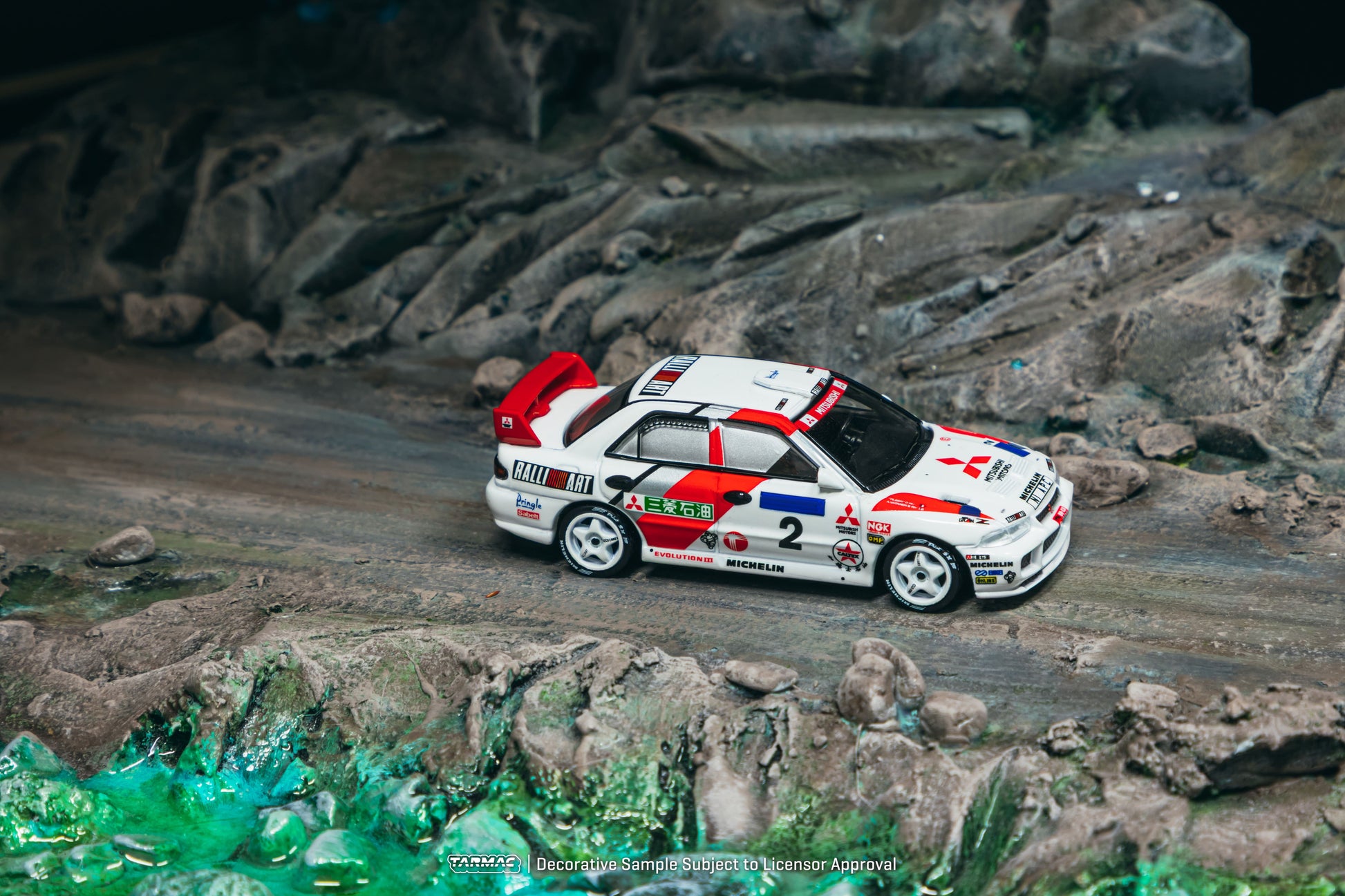Tarmac Works Mitsubishi Lancer Evolution III #2 Hong Kong–Beijing Rally winner from the Global64 series. Side