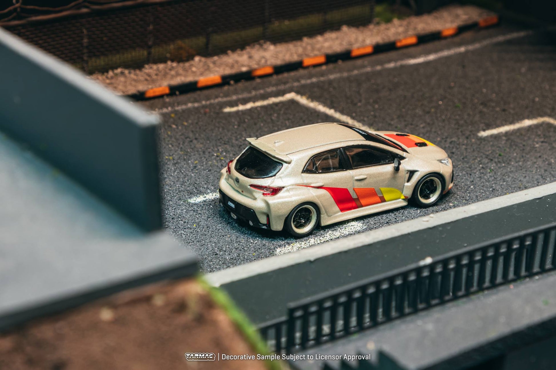 Tarmac Works 1:64 Toyota GR Corolla widebody beige Jon Sibal graphics diecast model. Back