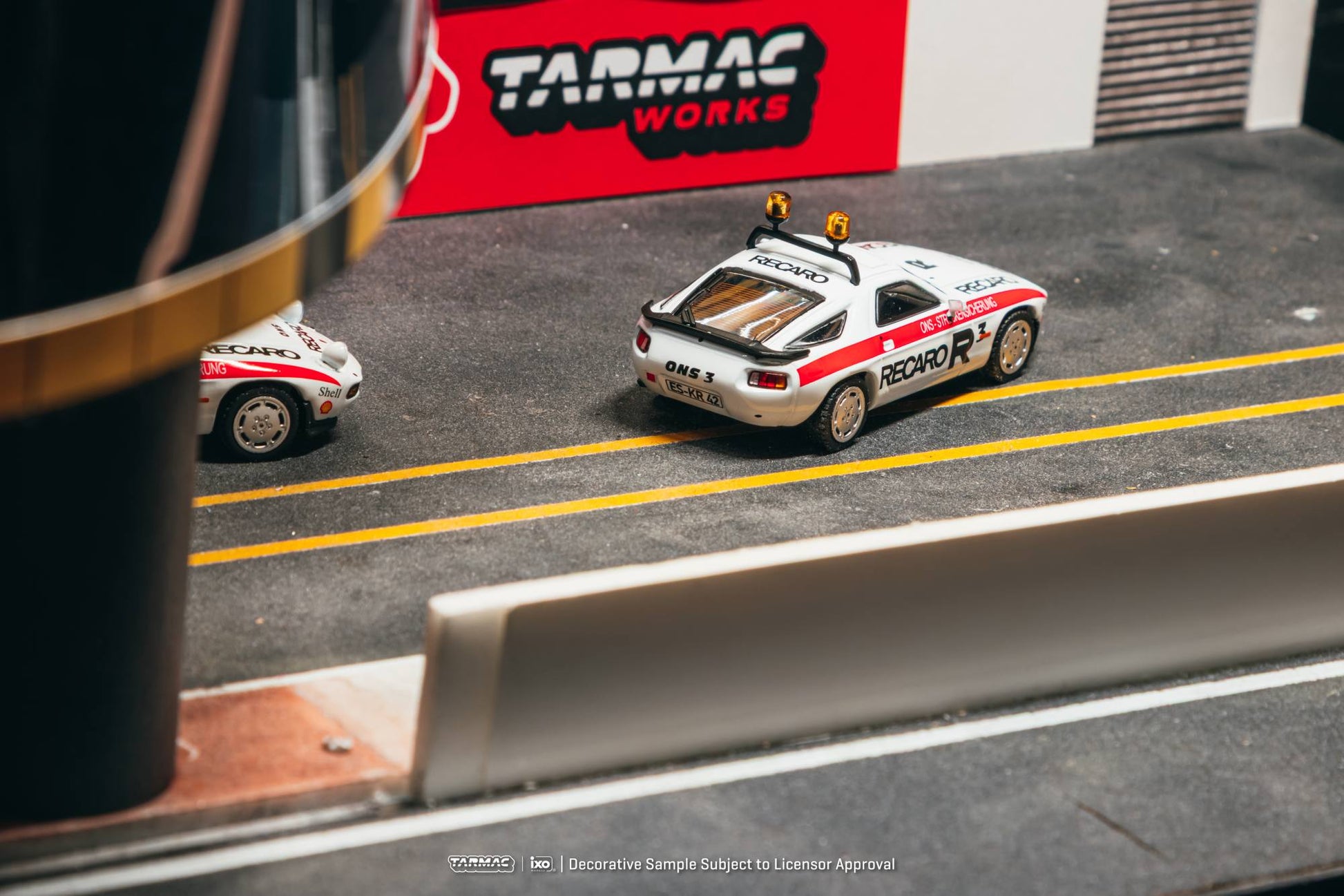 Tarmac Works 1:64 Porsche 928 S safety car white red ONS livery diecast model. Back
