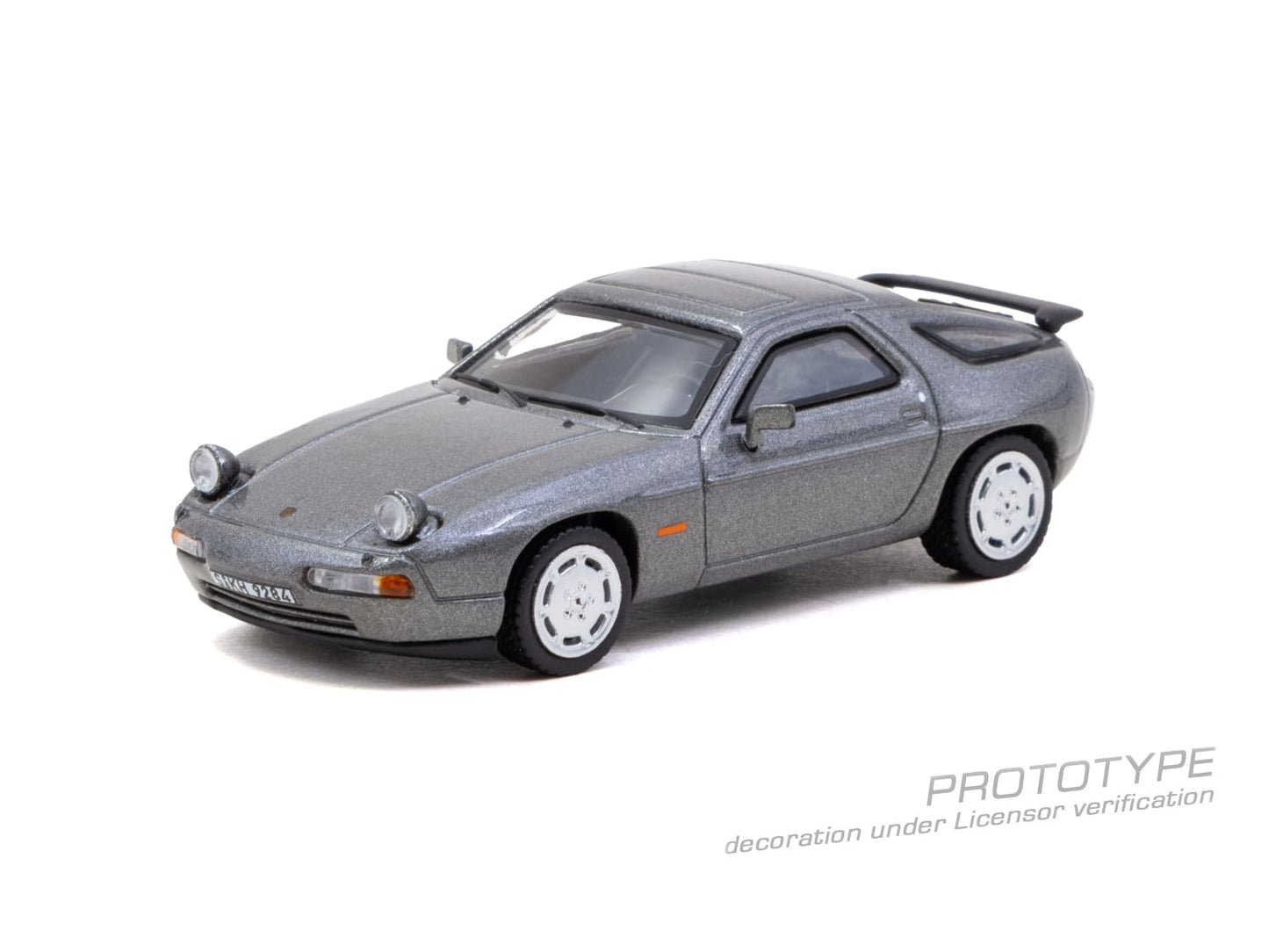 Tarmac Works Global64 Porsche 928 S4 in Grey Metallic with rolling wheels.