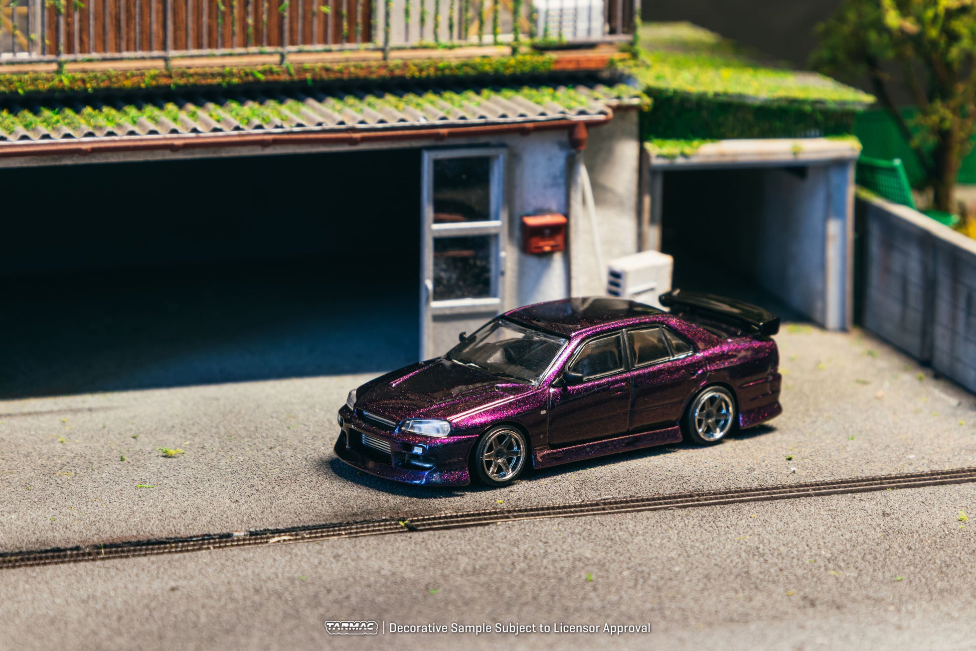 Tarmac Works Nissan Skyline ER34 URAS in Midnight Purple from the Global64 collection. Front