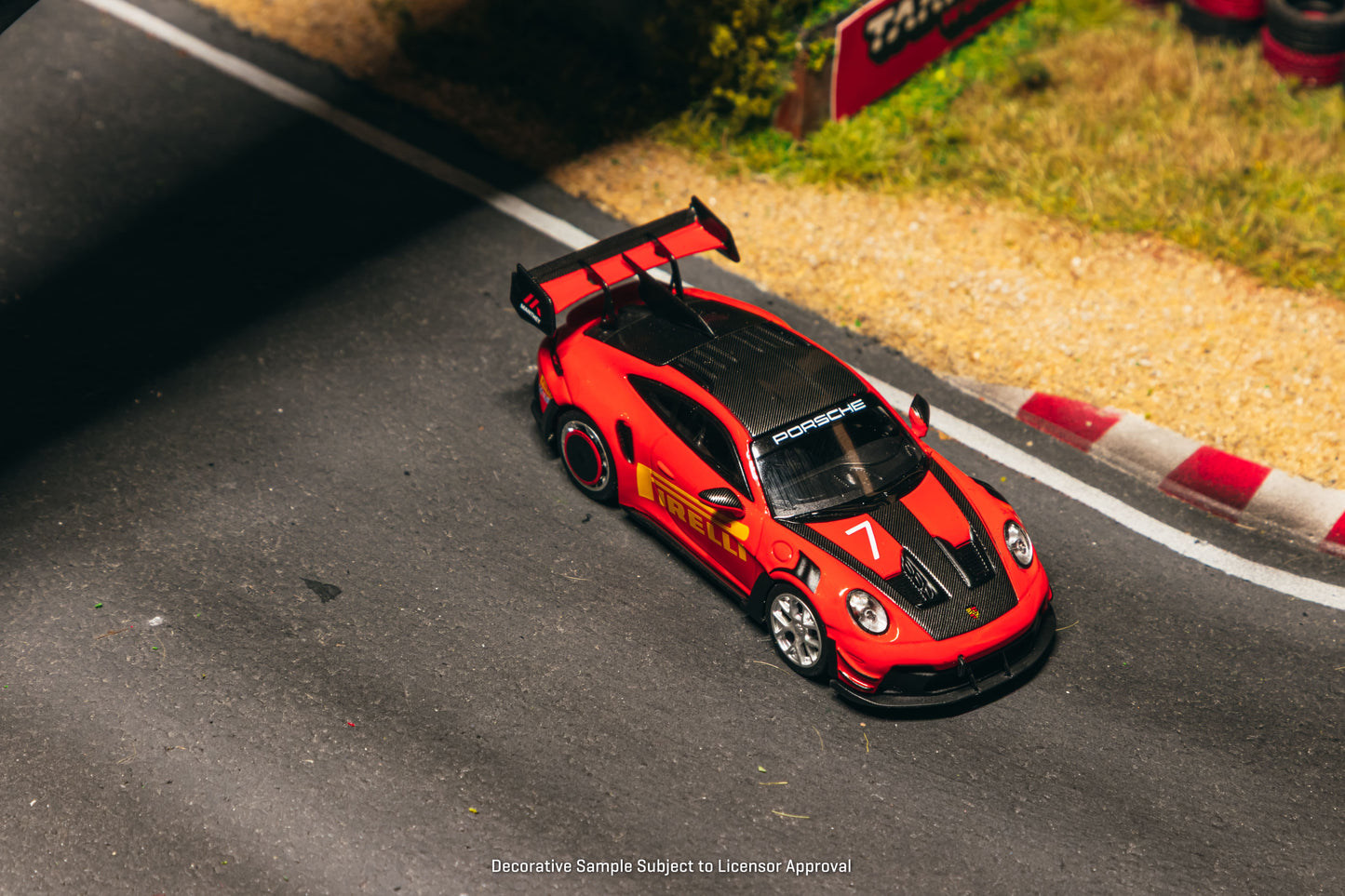 Tarmac Works Collab64 Porsche 911 GT3 RS Manthey Racing in red.