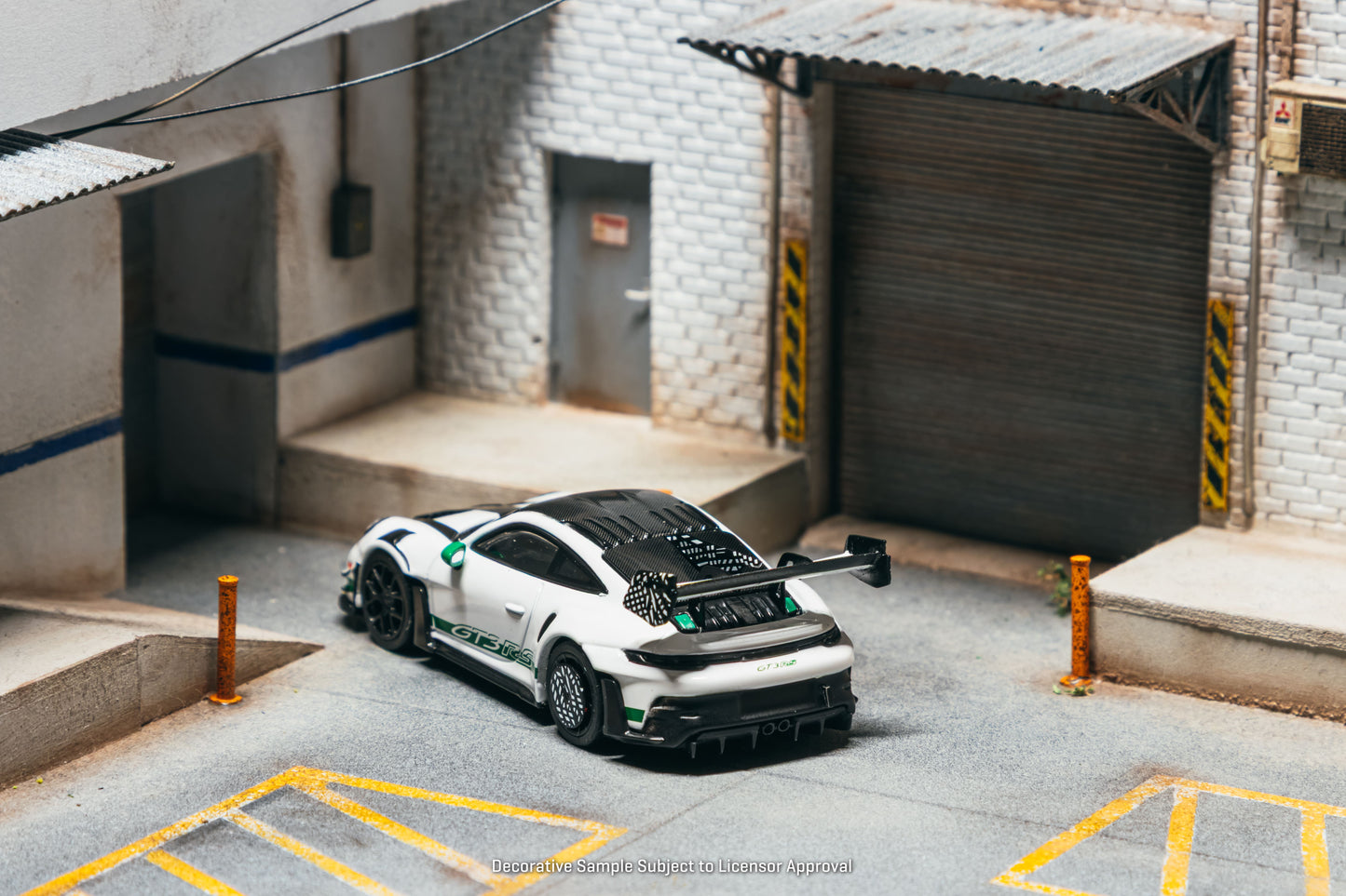 Tarmac Works Collab64 Porsche 911 GT3 RS Manthey Racing in white.