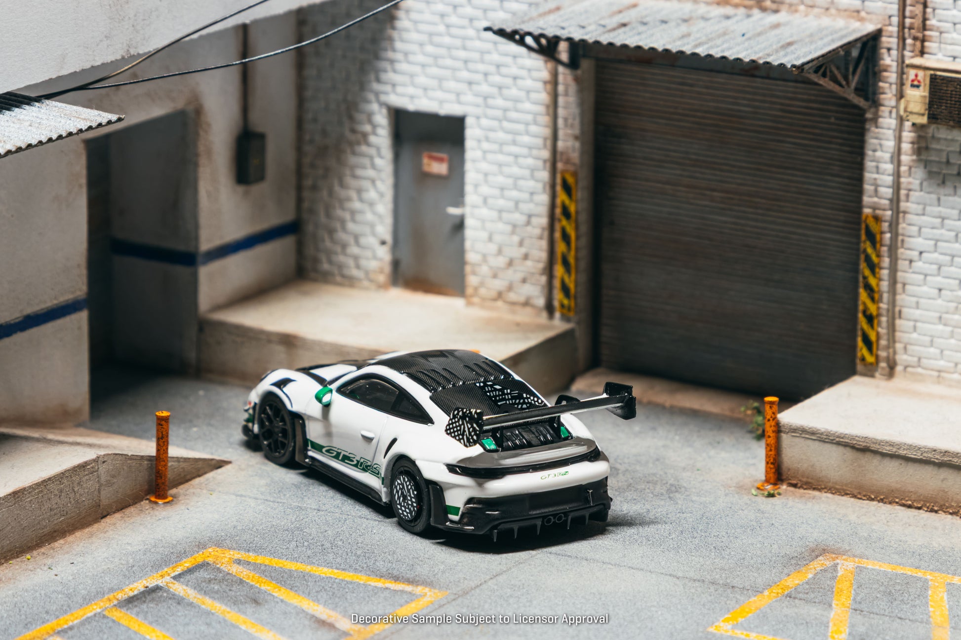 Tarmac Works Collab64 Porsche 911 GT3 RS Manthey Racing in white.