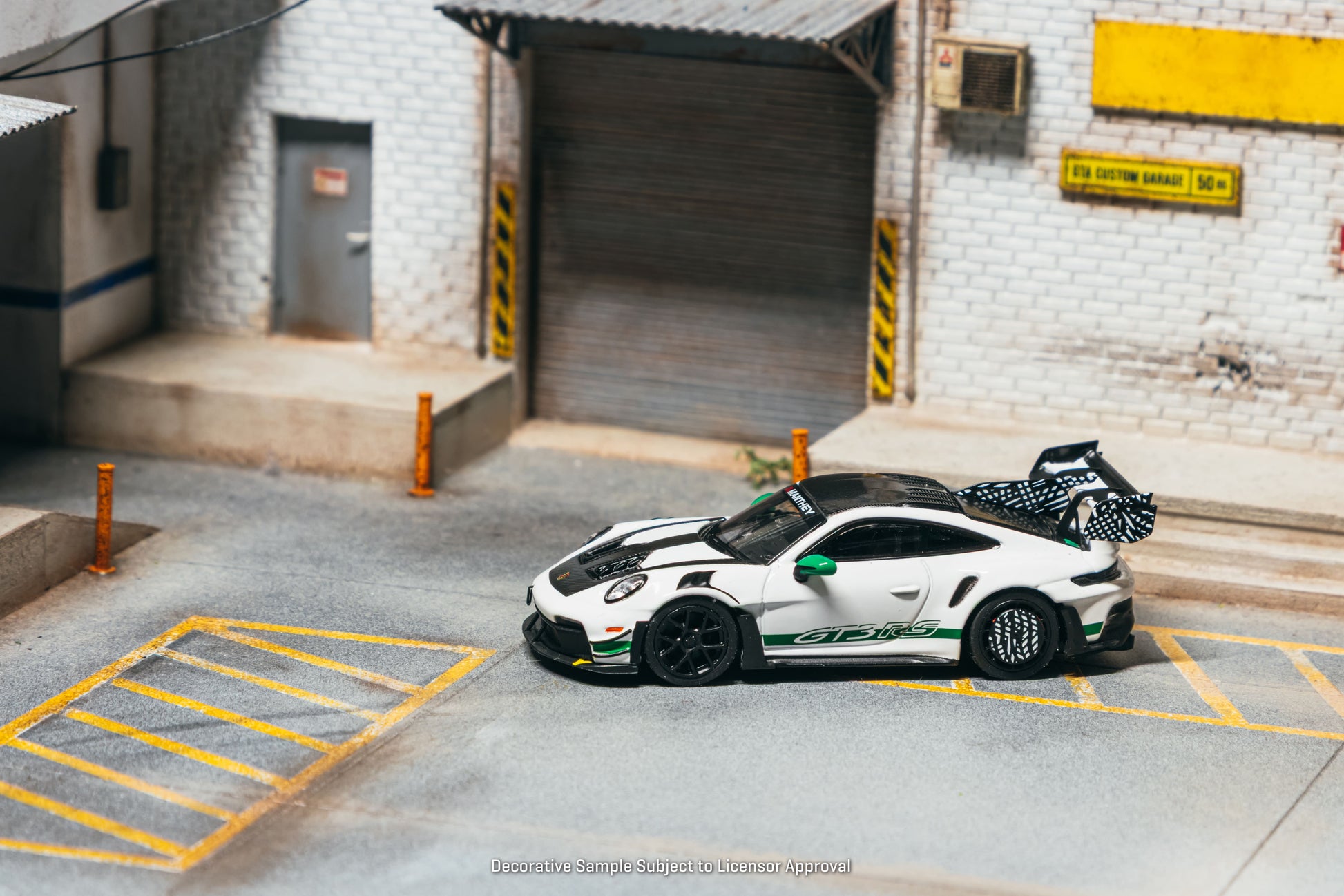 Tarmac Works Collab64 Porsche 911 GT3 RS Manthey Racing in white.