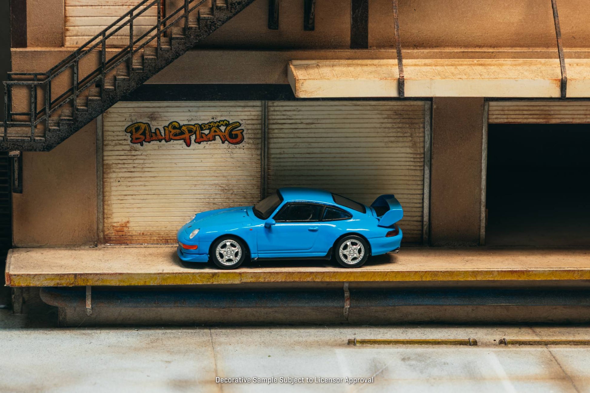 Tarmac Works Porsche 993 Carrera RS Clubsport in Riviera Blue from the Collab64 series. Side