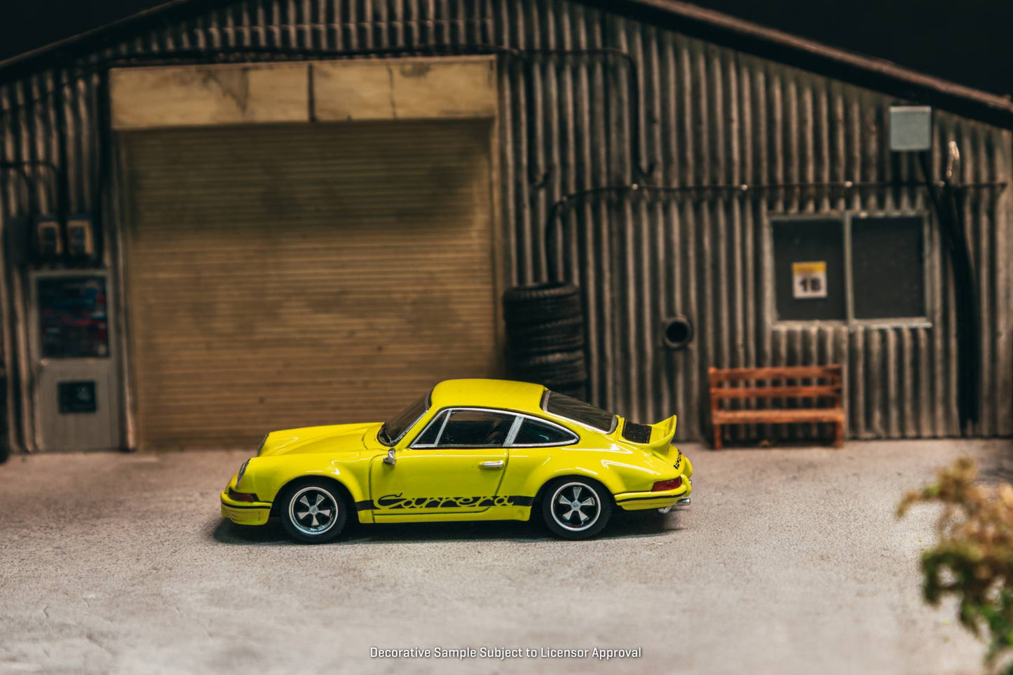 Tarmac Works 1:64 Porsche 911 Carrera RS 2.7 Lightweight yellow Schuco diecast model. Side