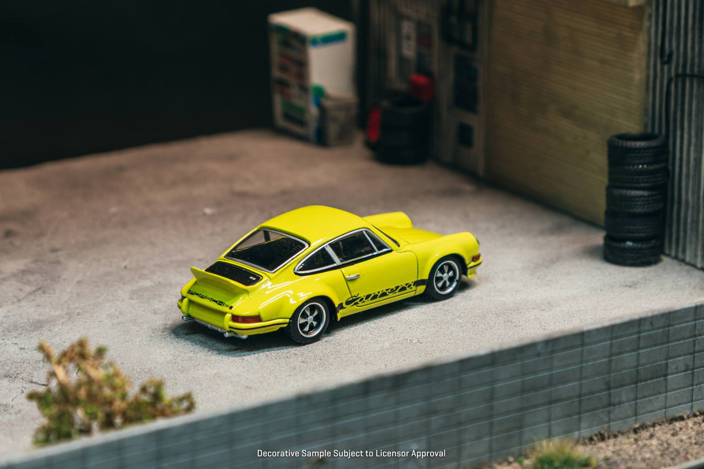 Tarmac Works 1:64 Porsche 911 Carrera RS 2.7 Lightweight yellow Schuco diecast model. Back