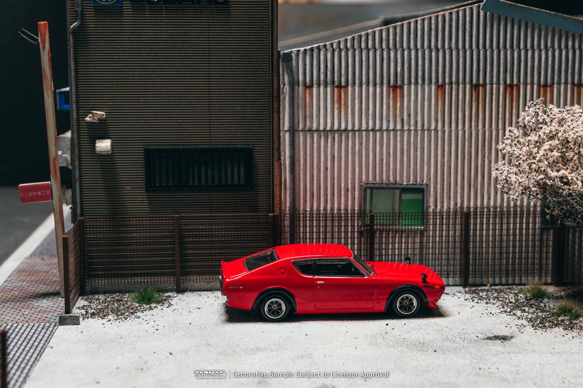 Tarmac Works 1972 Nissan Skyline 2000GT-R KPGC110 in red, a 1:64 Global64 diecast model.
