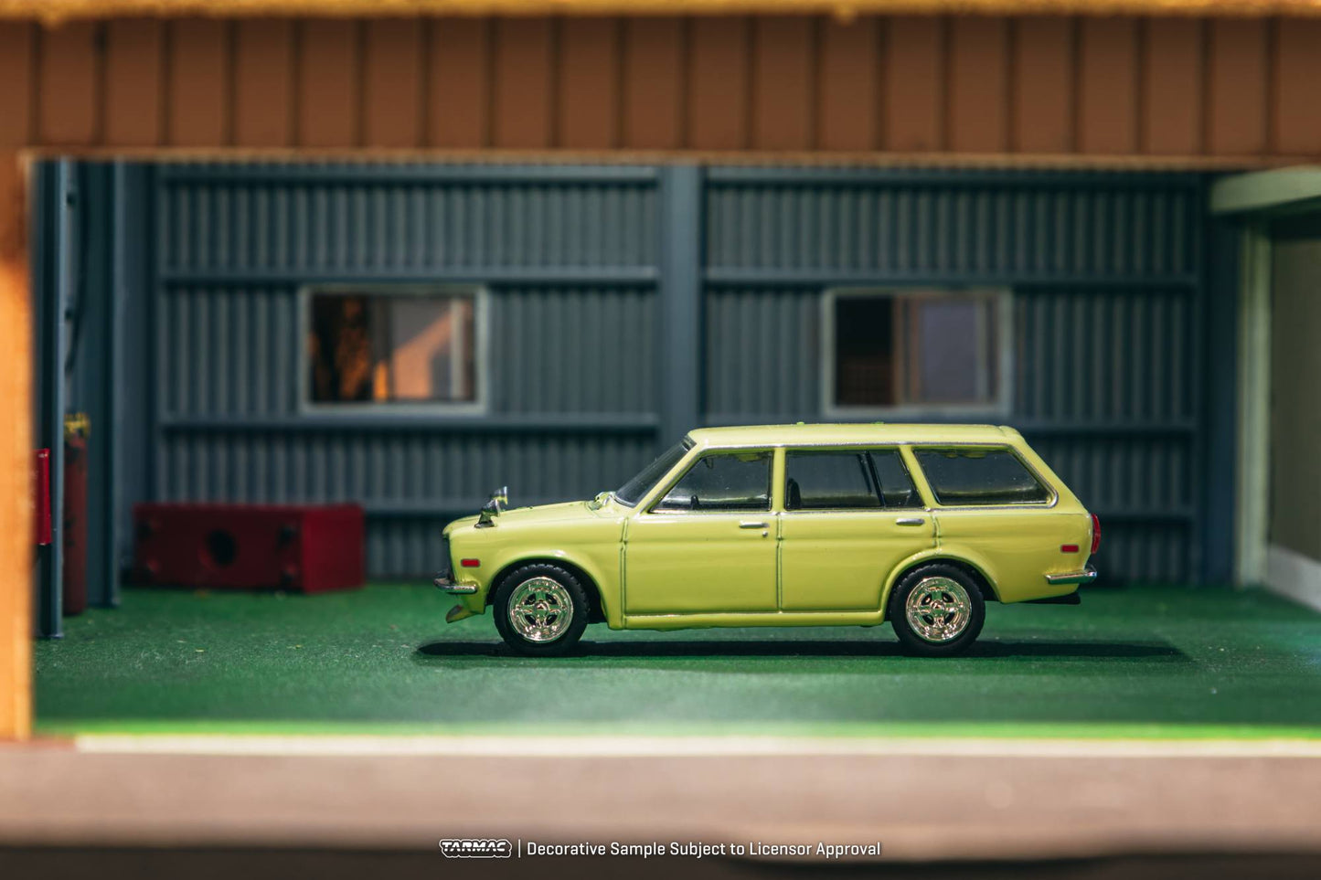 Tarmac Works 1:64 Datsun 510 Bluebird Wagon 1973 yellow diecast model. Side