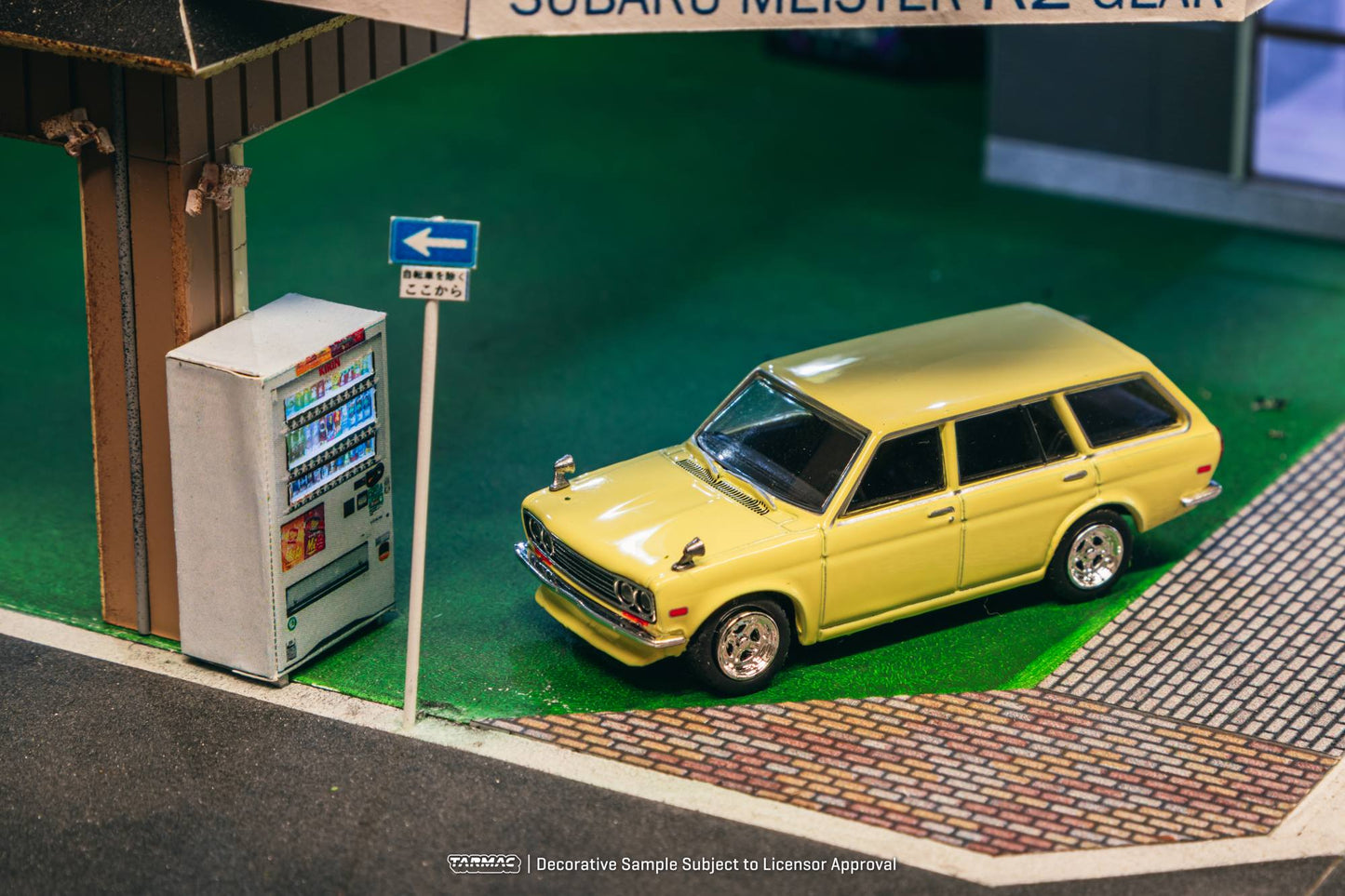 Tarmac Works 1:64 Datsun 510 Bluebird Wagon 1973 yellow diecast model. Top