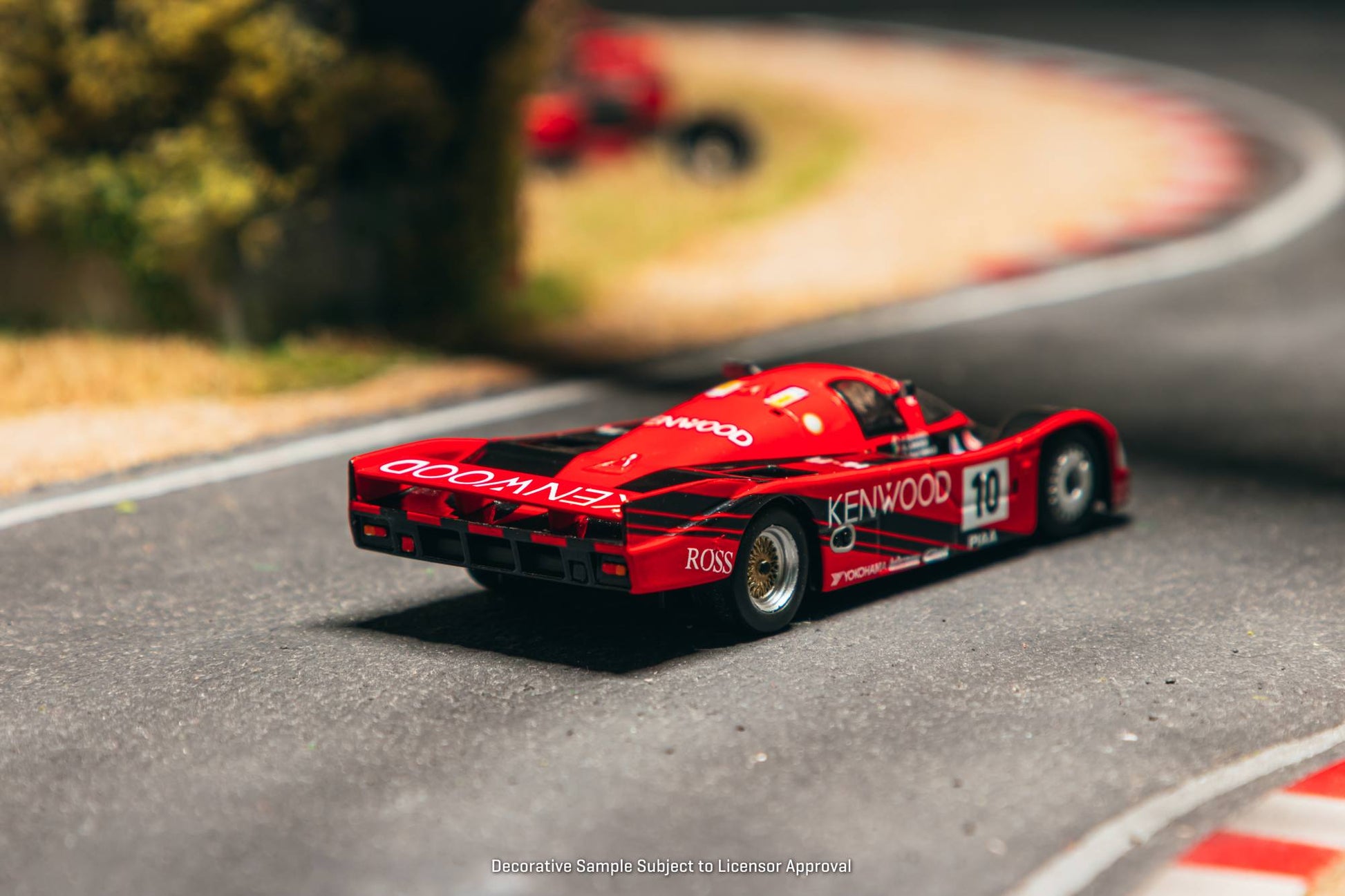 Tarmac Works 1:64 Porsche 962C #10 Kenwood Le Mans 1989 diecast model. Back
