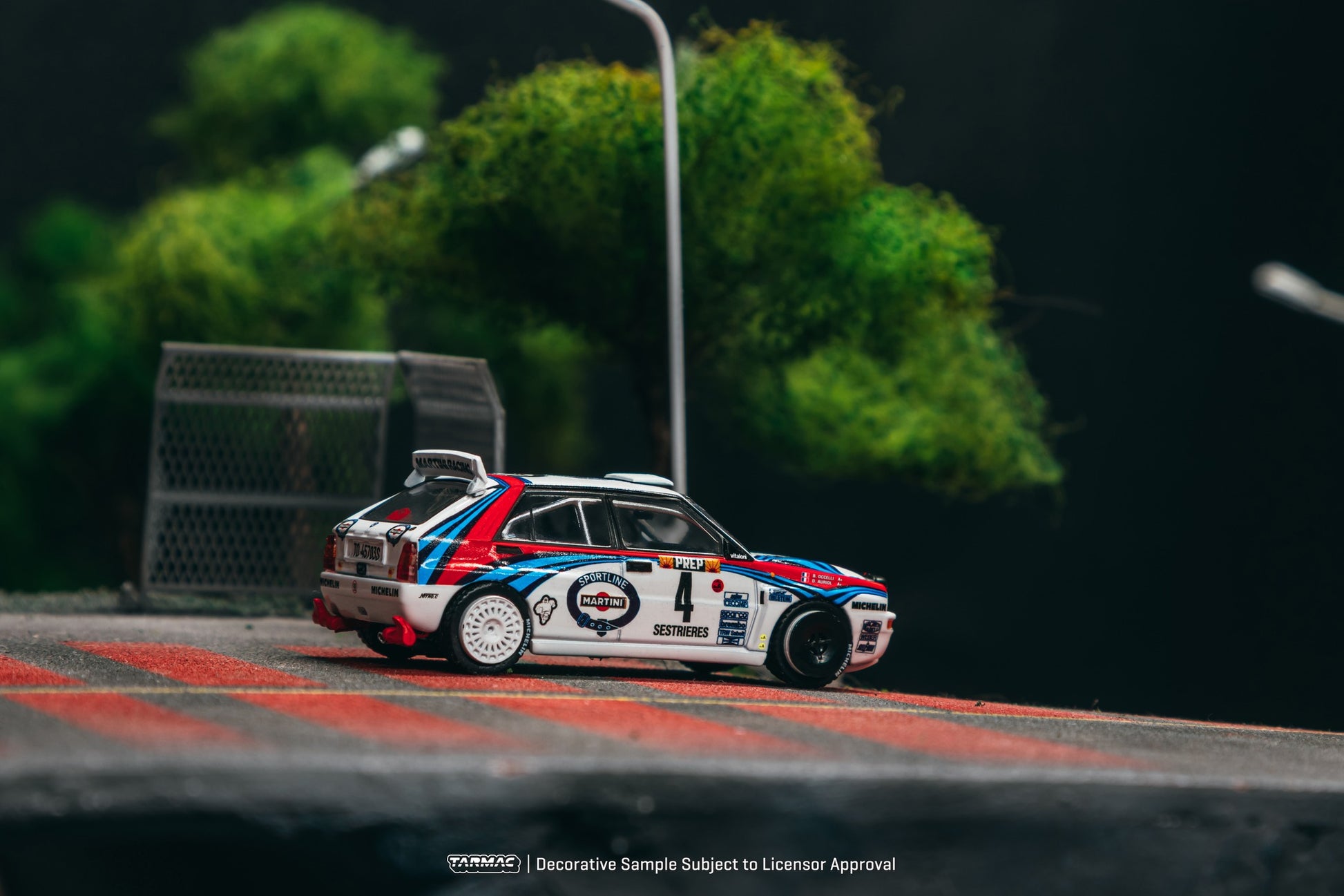 Tarmac Works 1992 Lancia Delta HF Integrale #4 Monte Carlo Rally Winner, Didier Auriol/Bernard Occelli, 1:64 scale model. Back