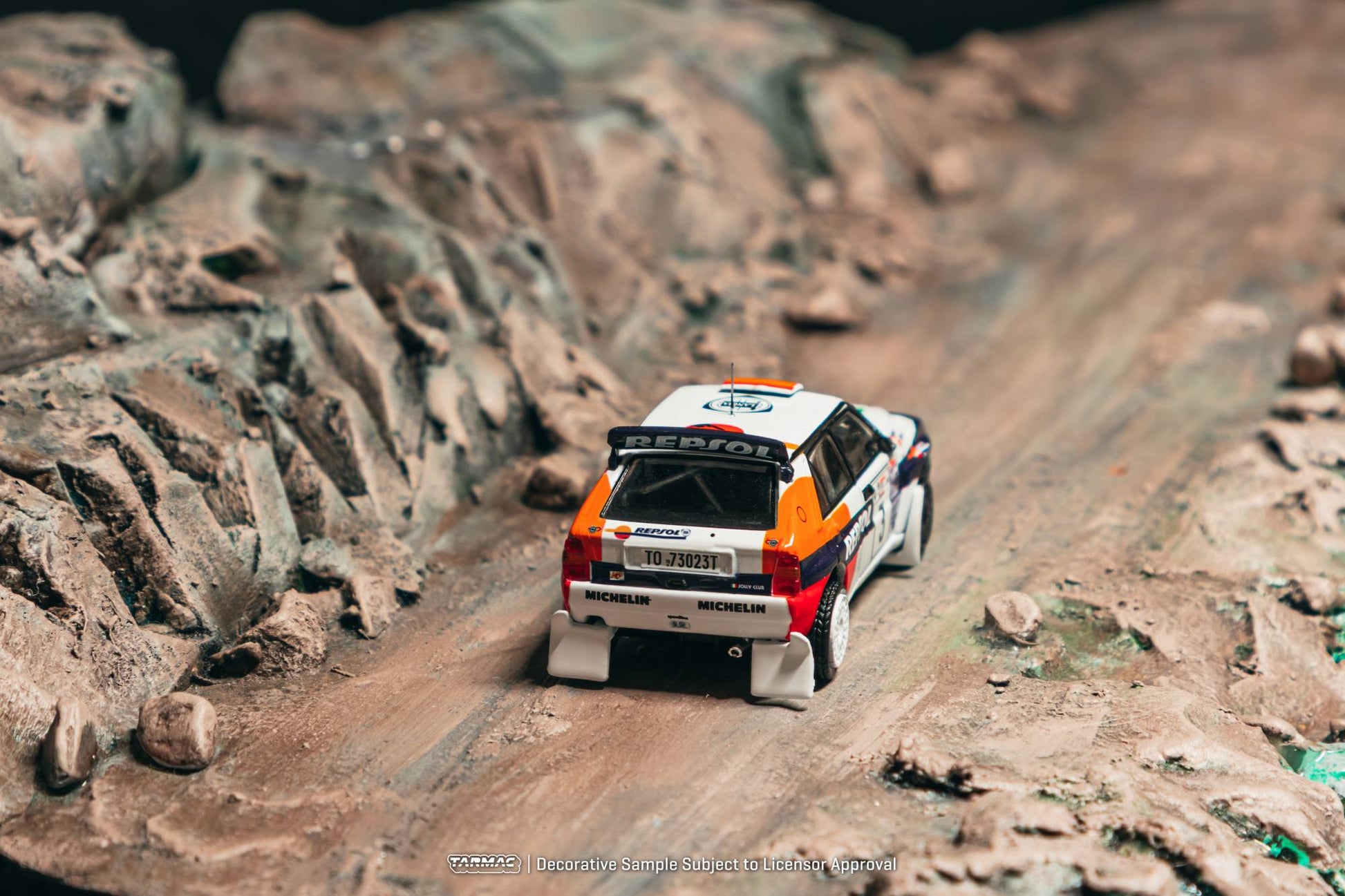 Tarmac Works 1:64 Lancia Delta HF Integrale 1993 Acropolis Rally Carlos Sainz white rally diecast model. Back