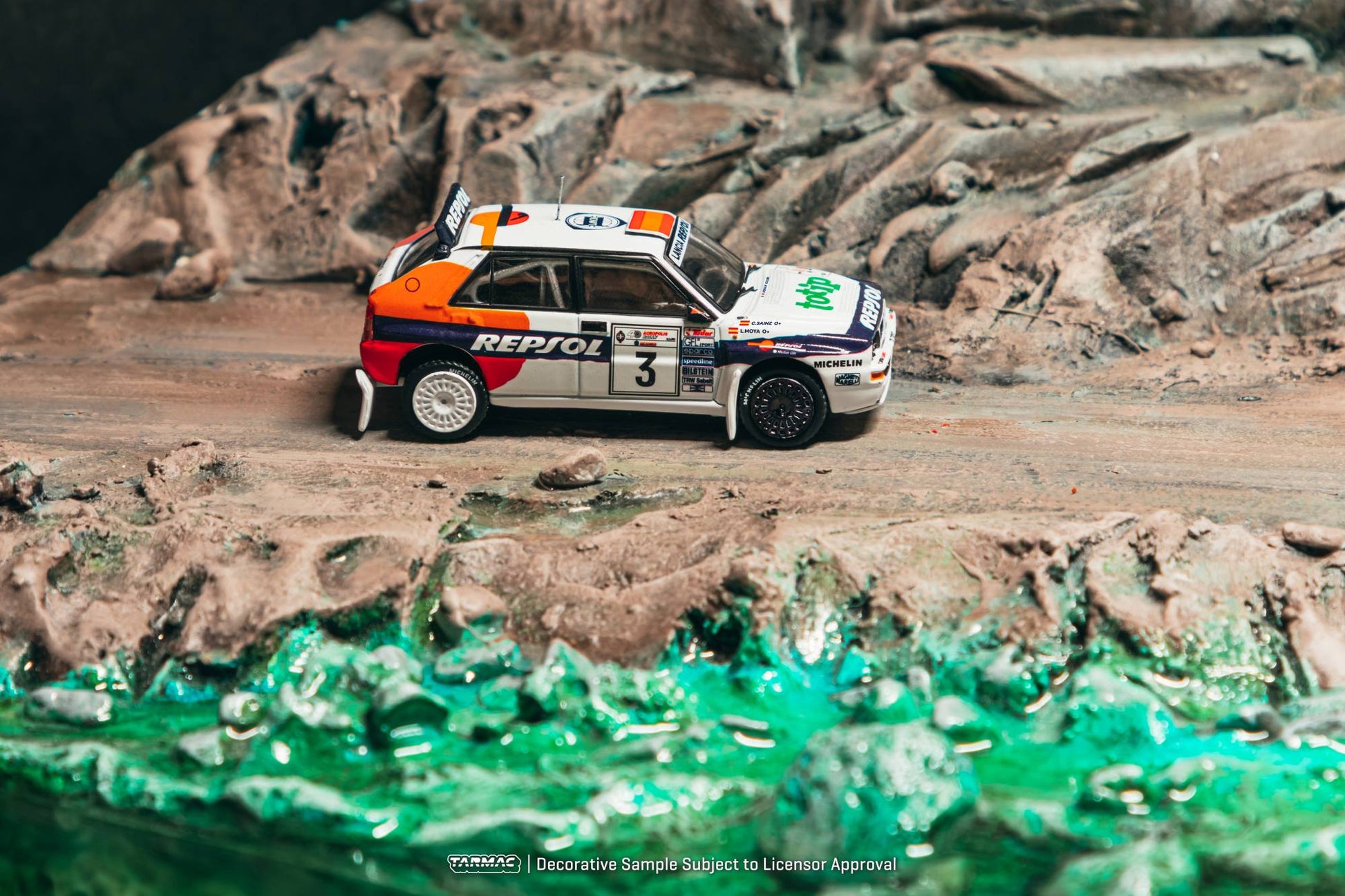 Tarmac Works 1:64 Lancia Delta HF Integrale 1993 Acropolis Rally Carlos Sainz white rally diecast model. Side