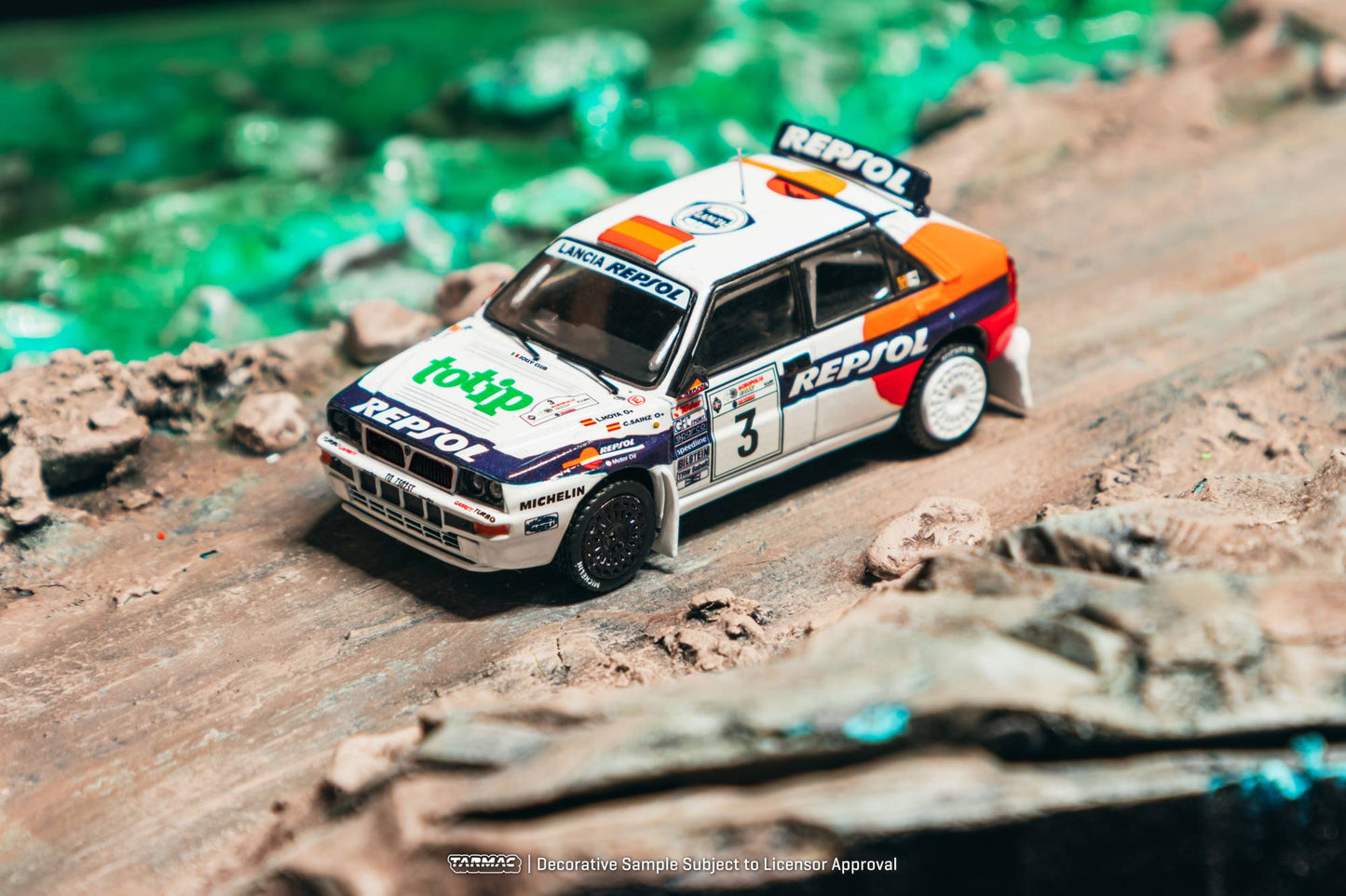 Tarmac Works 1:64 Lancia Delta HF Integrale 1993 Acropolis Rally Carlos Sainz white rally diecast model. Top