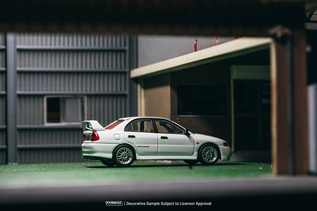 Tarmac Works 1996 Mitsubishi Lancer Evolution IV RS in white, a 1:64 Global64 diecast model.