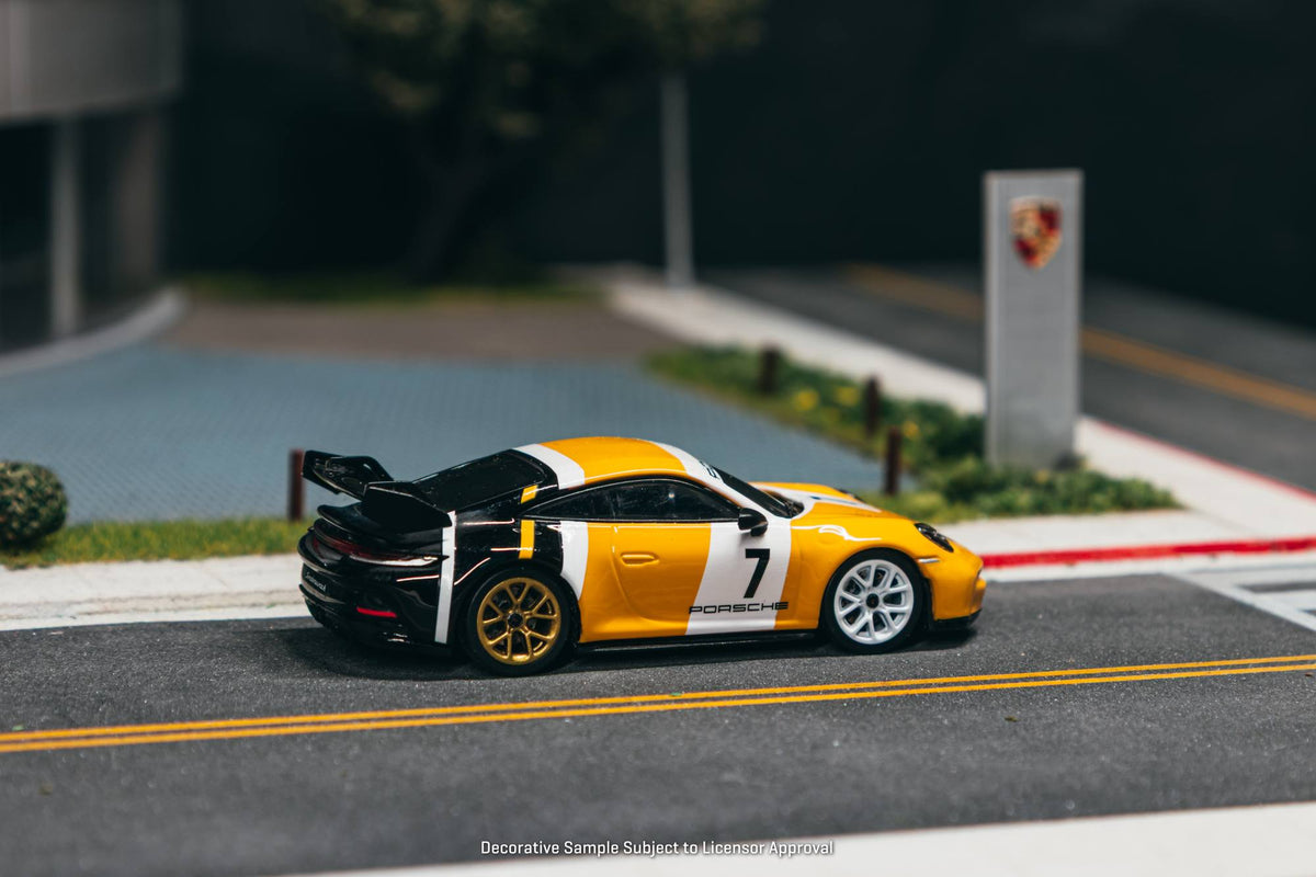 Tarmac Works 2022 Porsche 911 992 GT3 in black and yellow, a 1:64 Collab64 diecast model.