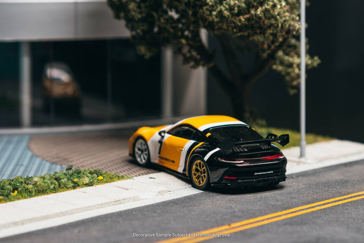 Tarmac Works 2022 Porsche 911 992 GT3 in black and yellow, a 1:64 Collab64 diecast model.