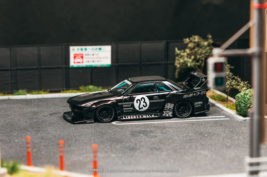 Tarmac Works 2025 Nissan Skyline R32 LB-Kaido Works in black, a widebody 1:64 Hobby64 collector model.