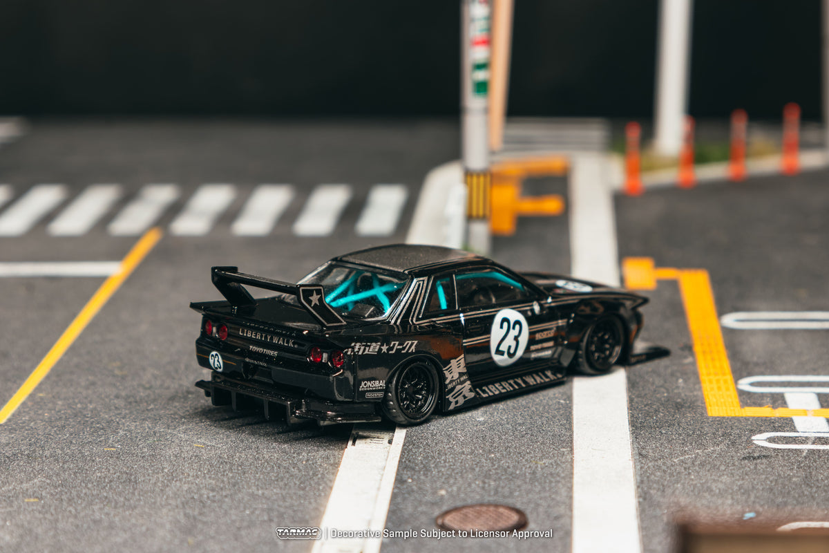 Tarmac Works 2025 Nissan Skyline R32 LB-Kaido Works in black, a widebody 1:64 Hobby64 collector model.