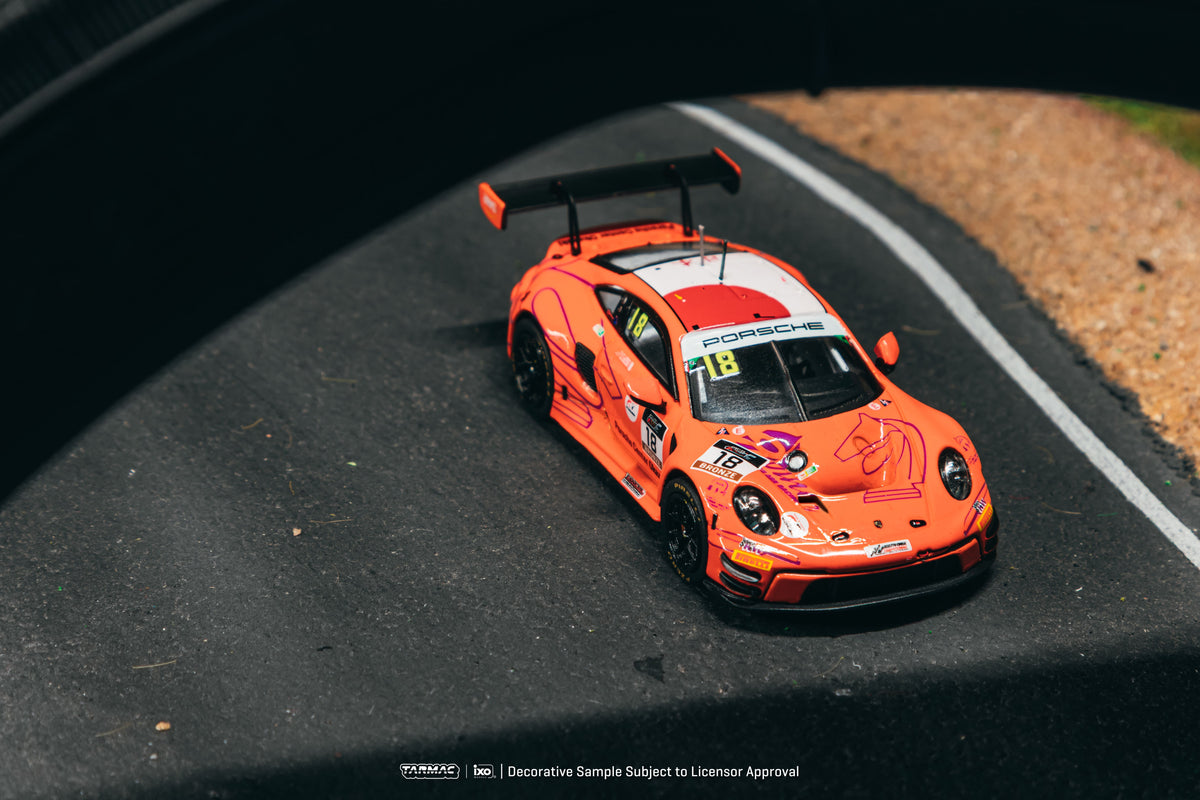 Tarmac Works 2025 Porsche 911 992 GT3 #18 Hiroaki Nagai Suzuka 1000km, a 1:64 Hobby64 model.