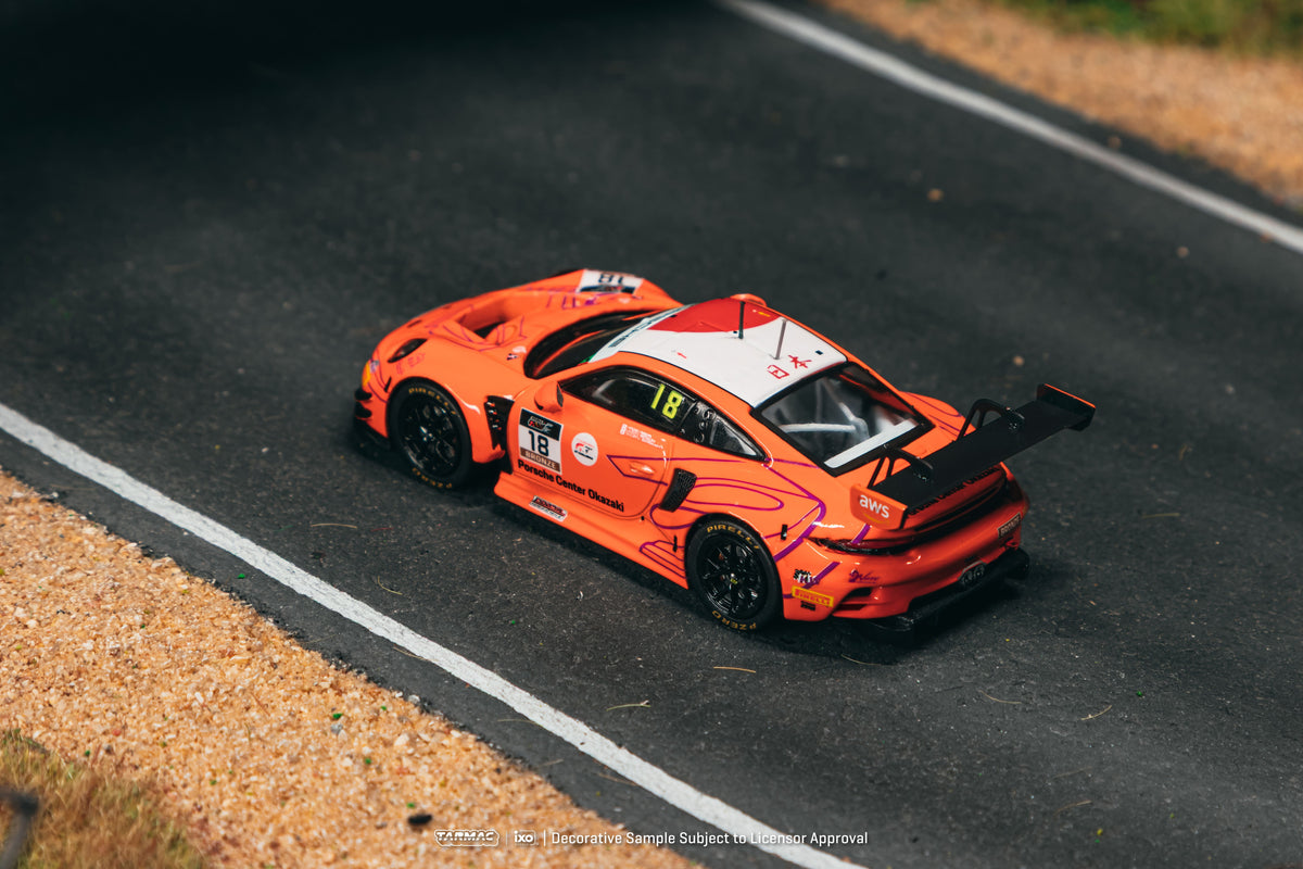 Tarmac Works 2025 Porsche 911 992 GT3 #18 Hiroaki Nagai Suzuka 1000km, a 1:64 Hobby64 model.