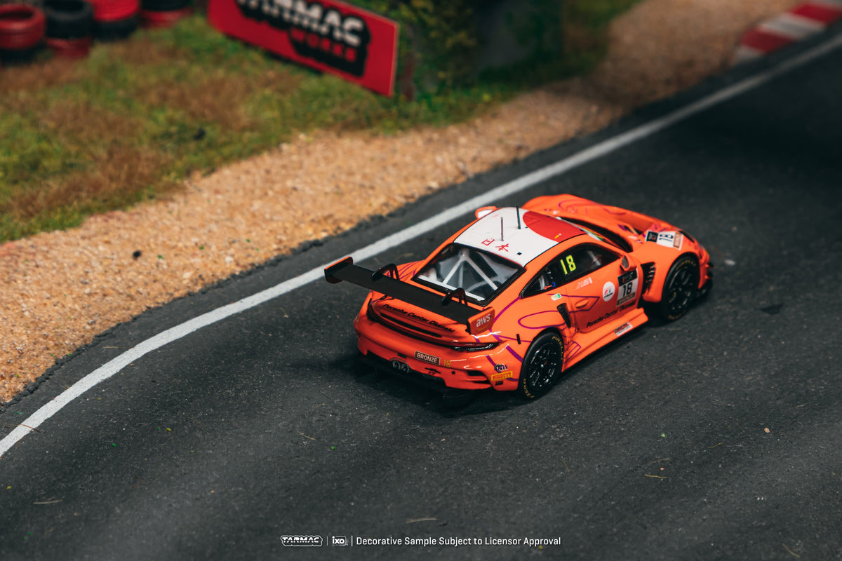 Tarmac Works 2025 Porsche 911 992 GT3 #18 Hiroaki Nagai Suzuka 1000km, a 1:64 Hobby64 model.