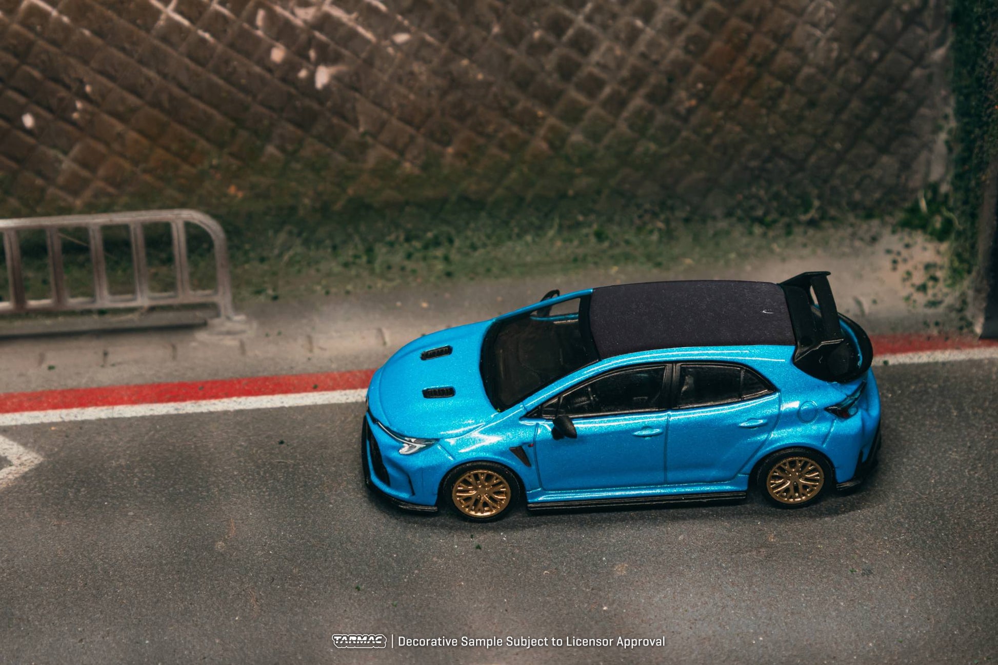 Tarmac Works 1:64 Toyota GR Corolla Flame Blue 2025 diecast model. Side