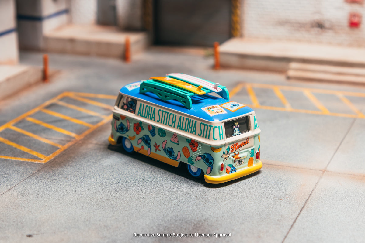 Tarmac Works 2025 Volkswagen Transporter T1 Panel Van Lilo & Stitch, a 1:64 Hobby64 model in an acrylic display case.