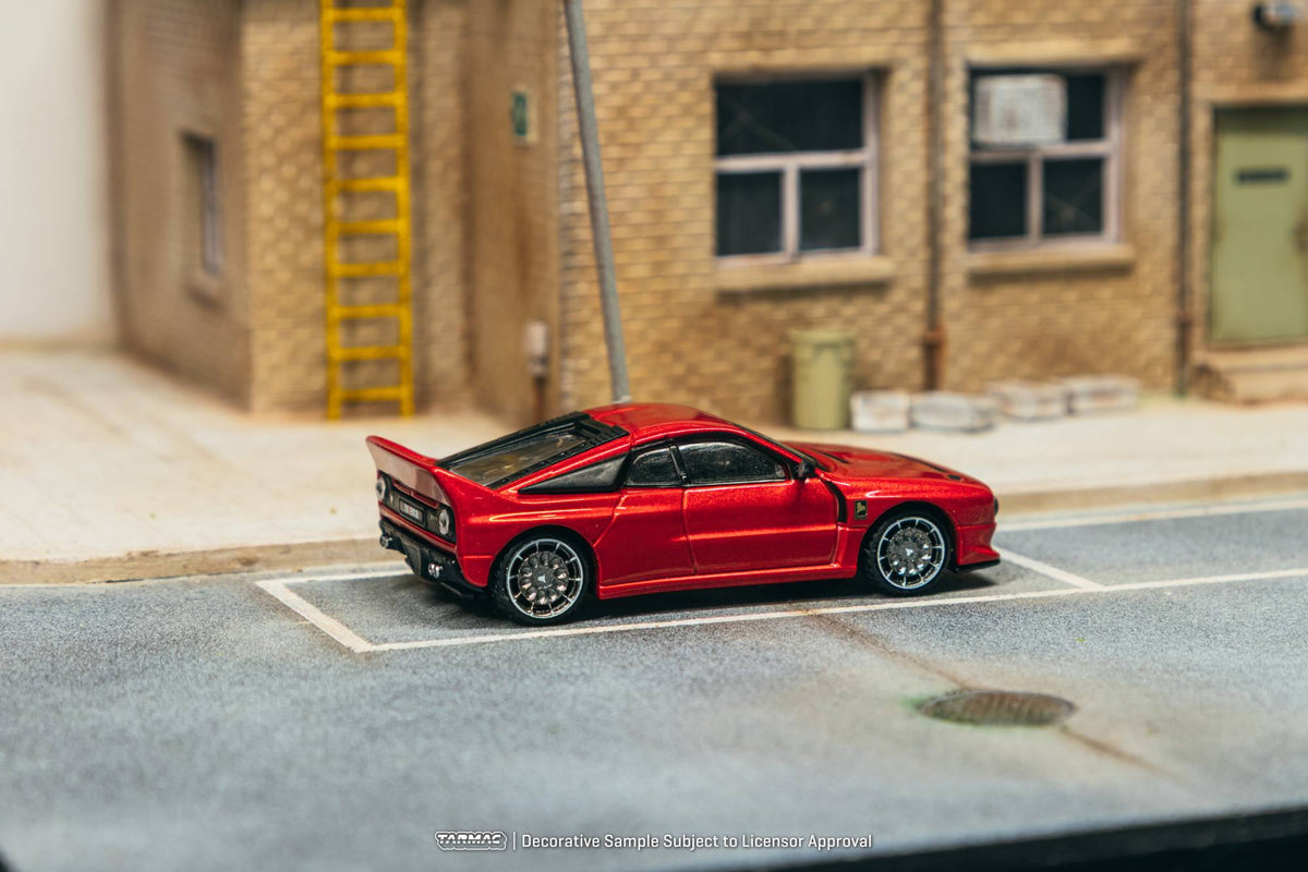Tarmac Works 2026 Kimera EVO38 in red, a 1:64 Global64 diecast model inspired by Italian rally heritage.