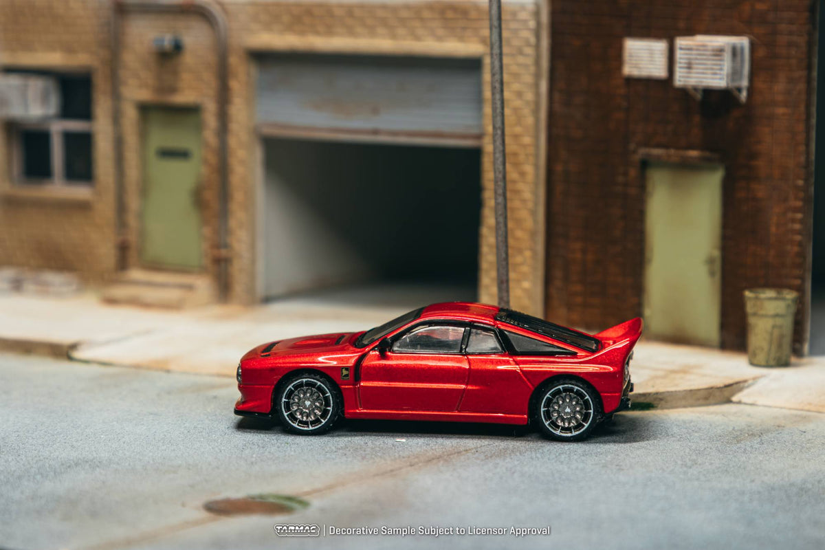 Tarmac Works 2026 Kimera EVO38 in red, a 1:64 Global64 diecast model inspired by Italian rally heritage.