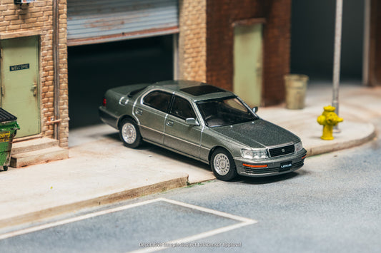 Tarmac Works Lexus LS400 UCF10 in Flint Grey 1:64 diecast car with factory wheels and chrome details. Front