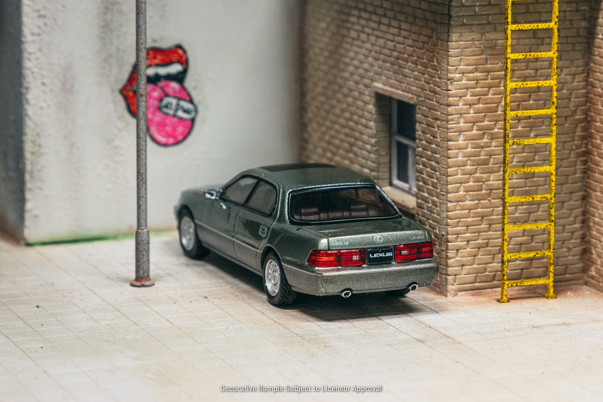 Tarmac Works Lexus LS400 UCF10 in Flint Grey 1:64 diecast car with factory wheels and chrome details. Back