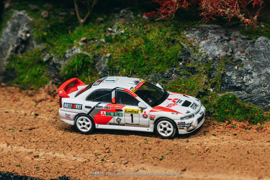 Tarmac Works Mitsubishi Lancer Evolution IV #1 Monte Carlo Rally 1997 diecast car in red WRC livery. Side