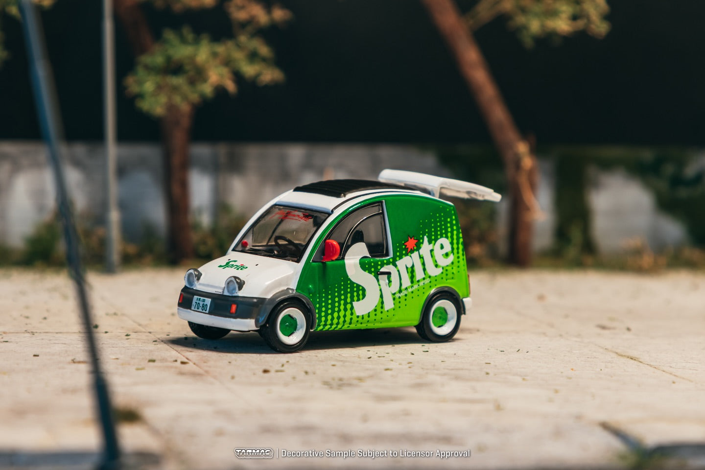 Tarmac Works Nissan S-Cargo Sprite livery green display base acrylic cover diecast 1:64. Front
