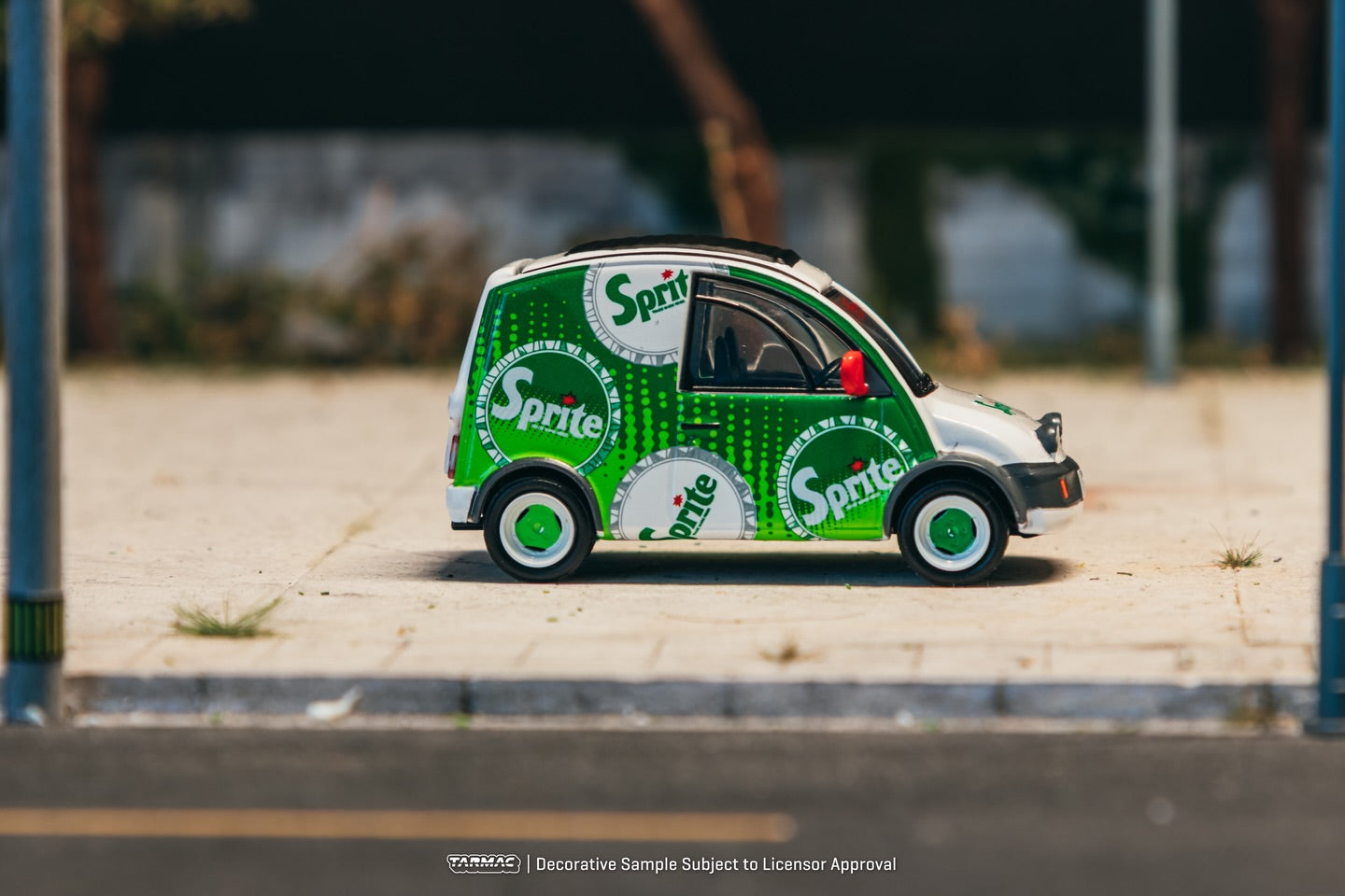 Tarmac Works Nissan S-Cargo Sprite livery green display base acrylic cover diecast 1:64. Side