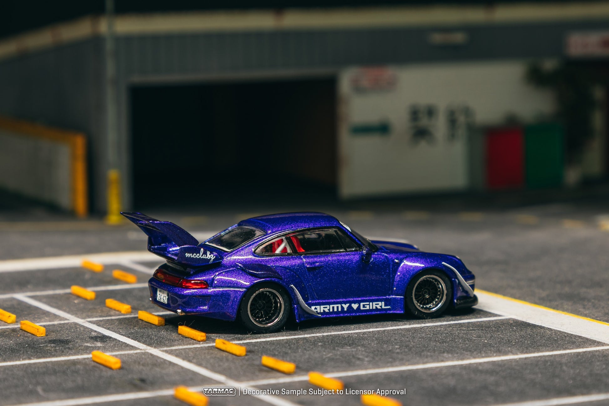 1:64 scale Tarmac Works RWB Porsche 993 Army Girl in metallic purple with wide-body kit. Back