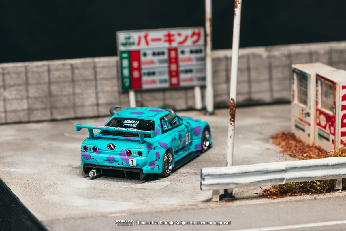 Tarmac Works Global64 Nissan Skyline R32 Widebody designed by Jon Sibal with Sulley-inspired graphics in 1:64 scale