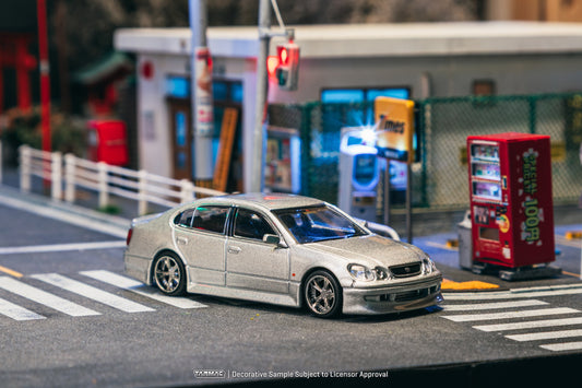 1:64 scale Tarmac Works Vertex Toyota Aristo JZS161, new tooling featuring Vertex aero kit, detailed headlights, wheels, and authentic VIP-style stance. Front
